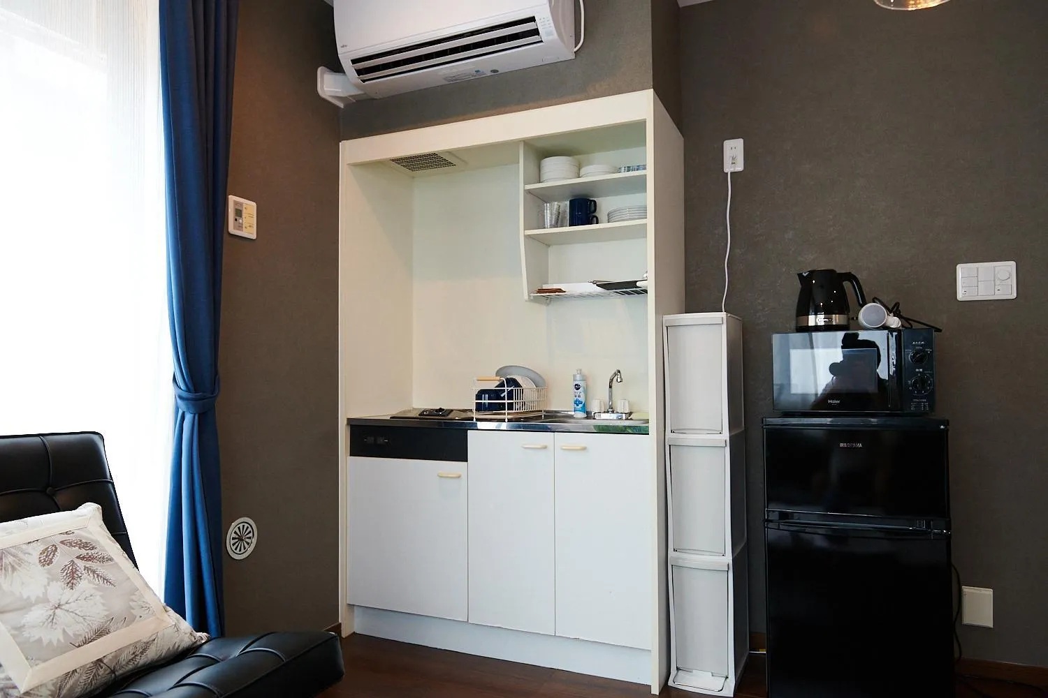 Kitchen or kitchenette in Ueno Residence Hotel Matsumoto