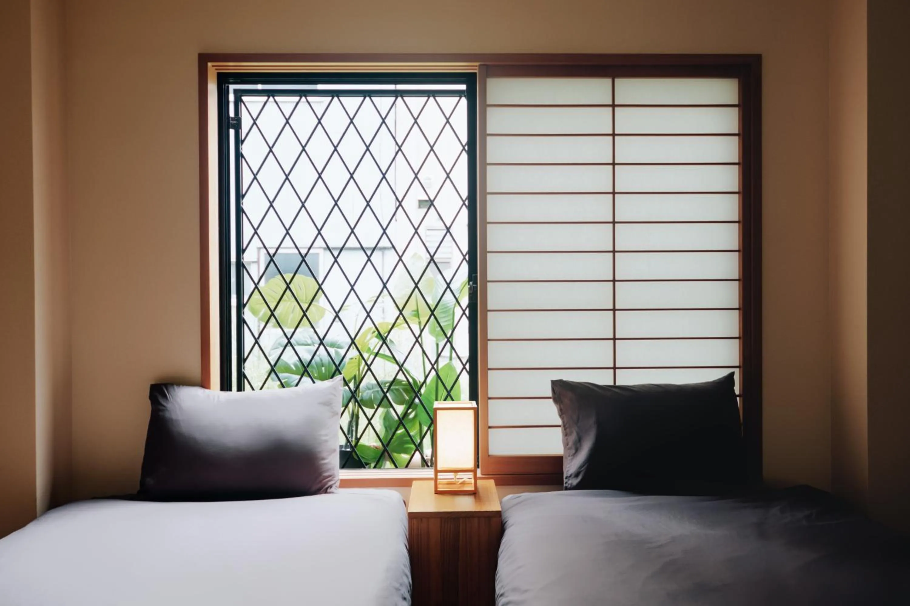 Bed in Ueno Residence Hotel Matsumoto