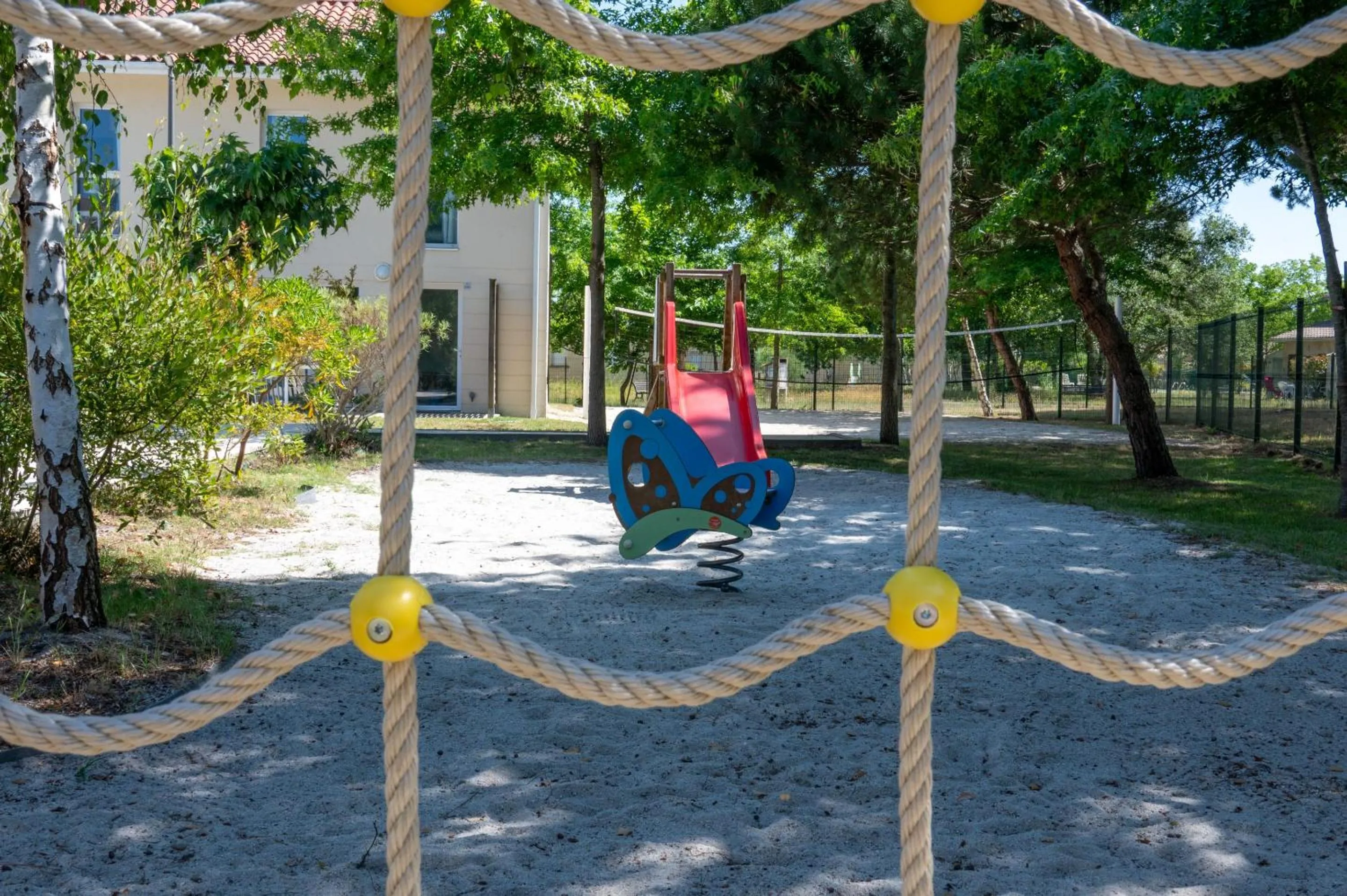 Children play ground in Résidence Odalys Le Petit Pont