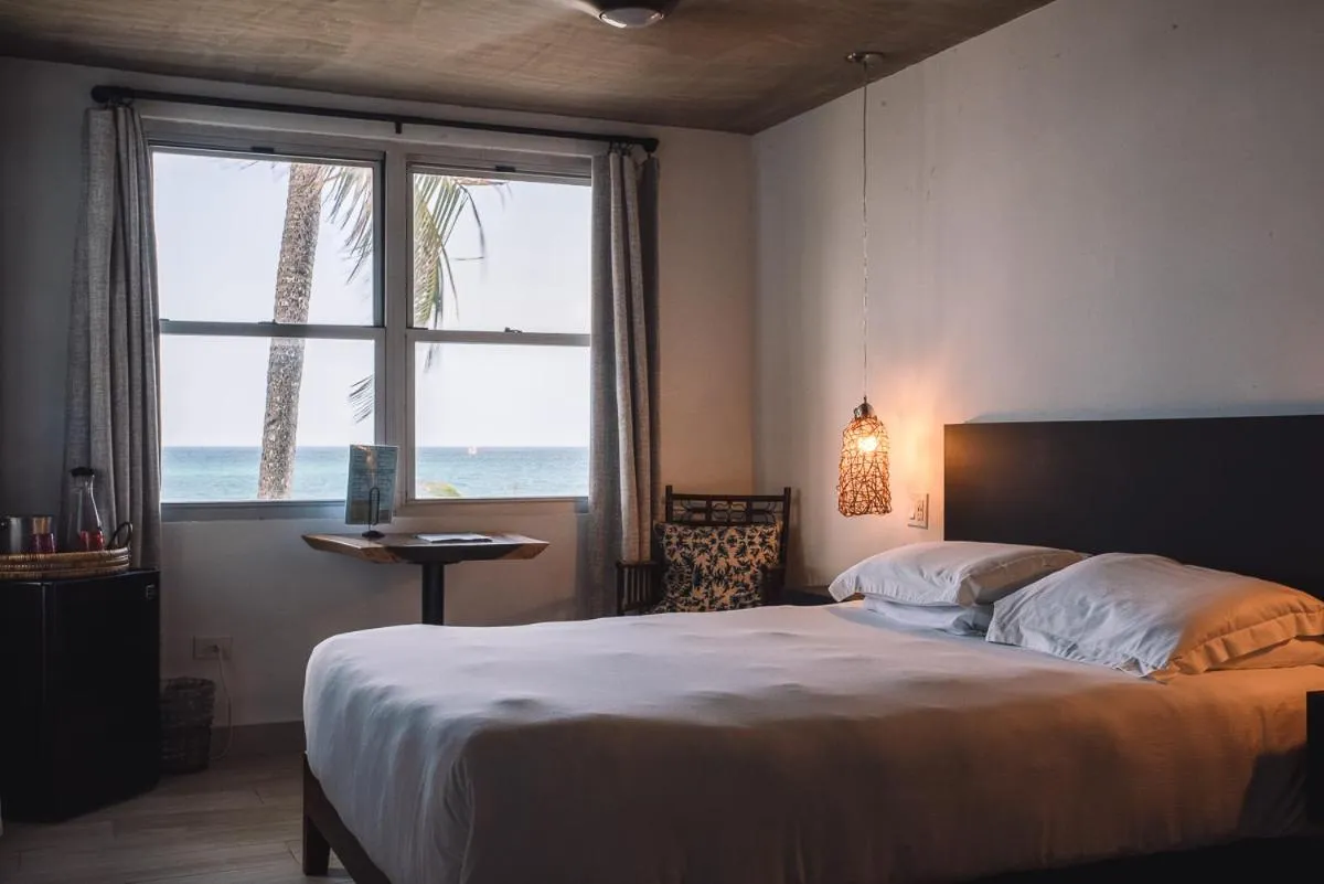 Bed in Numero Uno Beach House