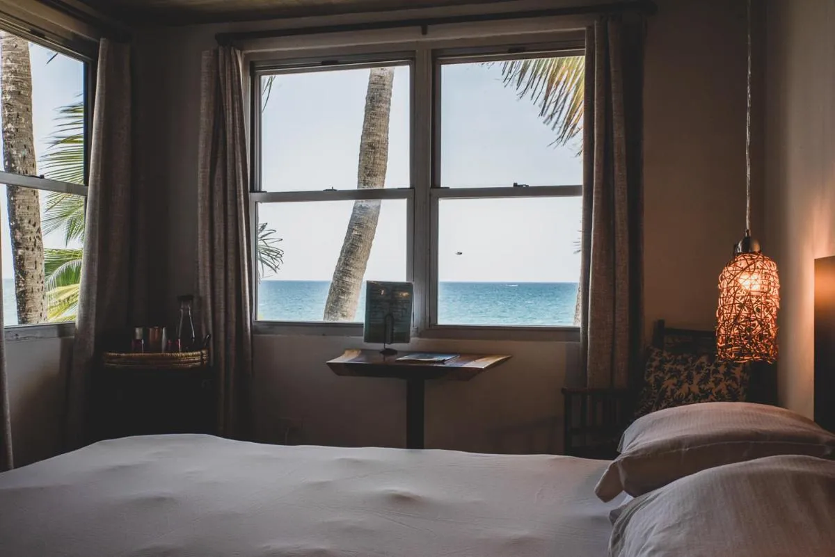 Bed in Numero Uno Beach House