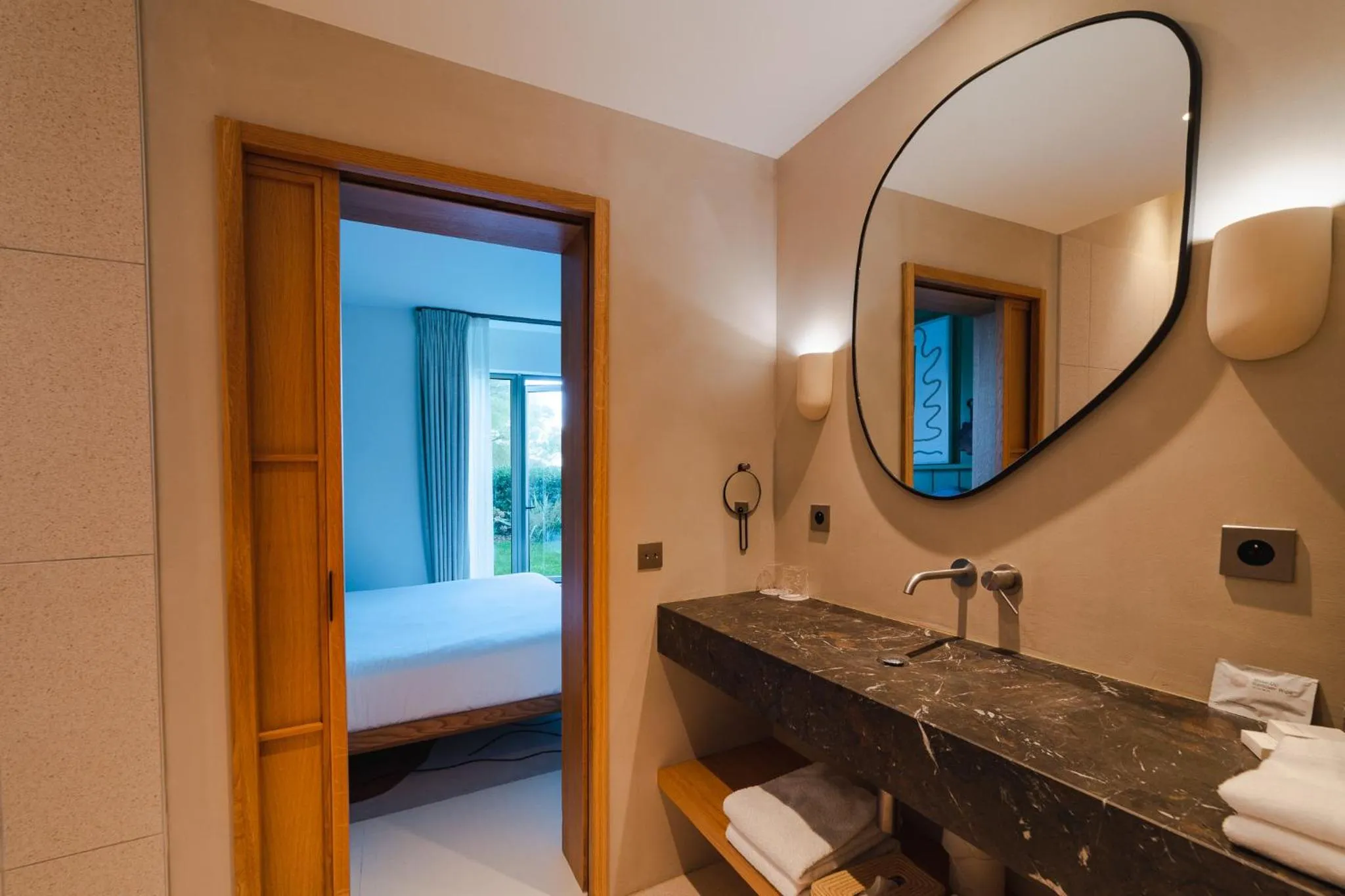 Bathroom, Bed in Hôtel de La Plage