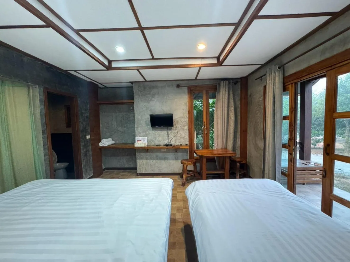 Bed in The Nanda Resort