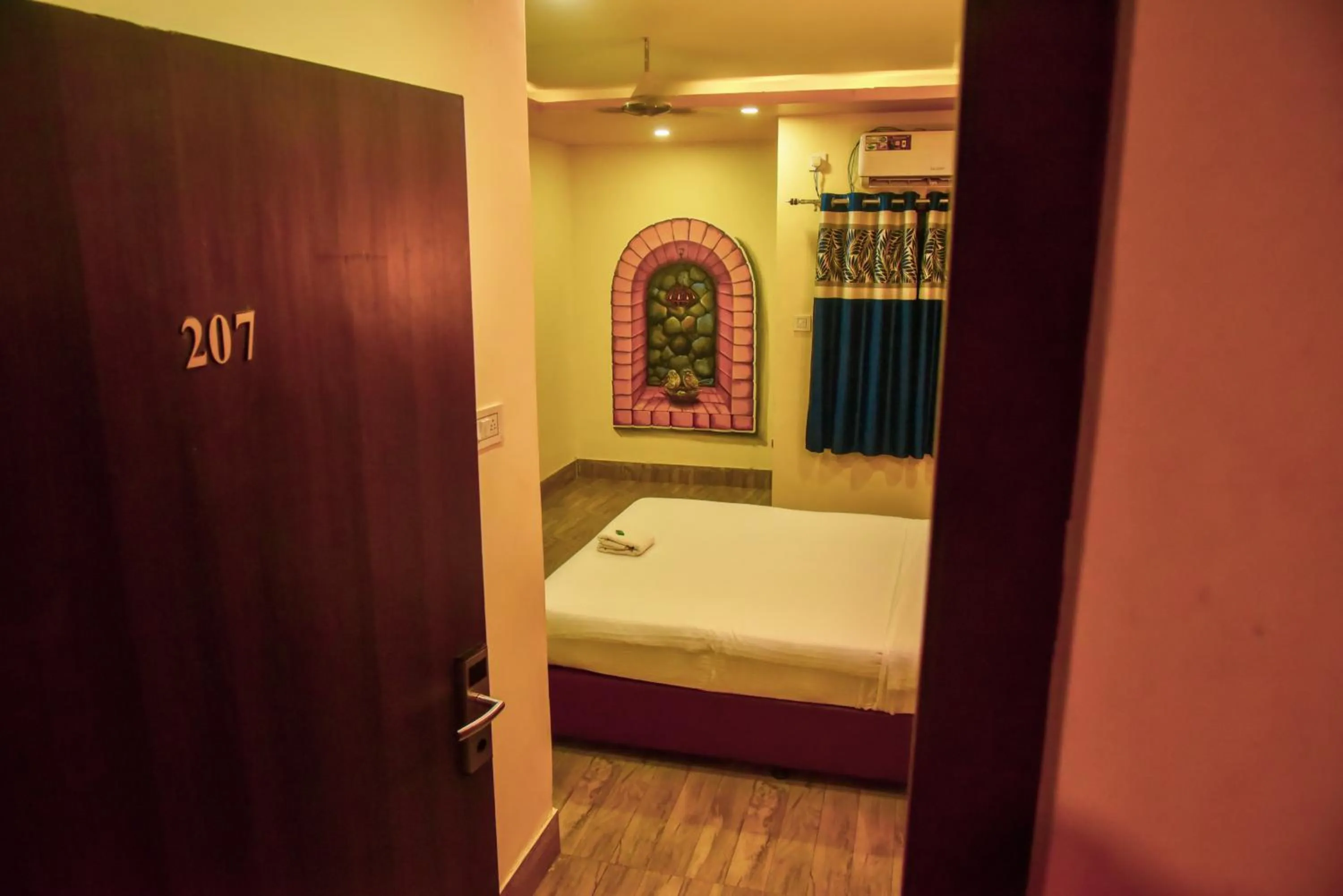 Photo of the whole room, Bed in Ratna Resort near Bhubaneswar Airport