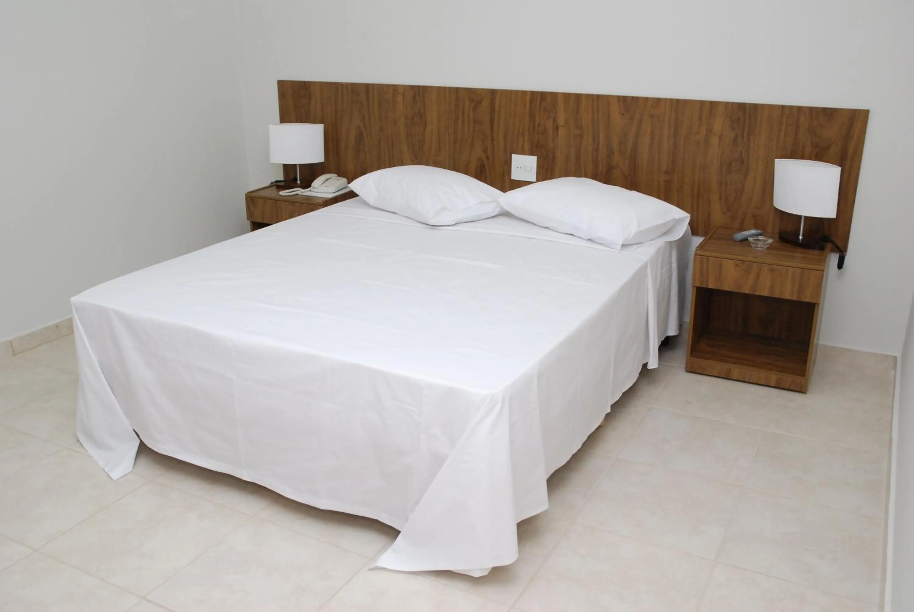 Bed in Monte Castro Executive Hotel