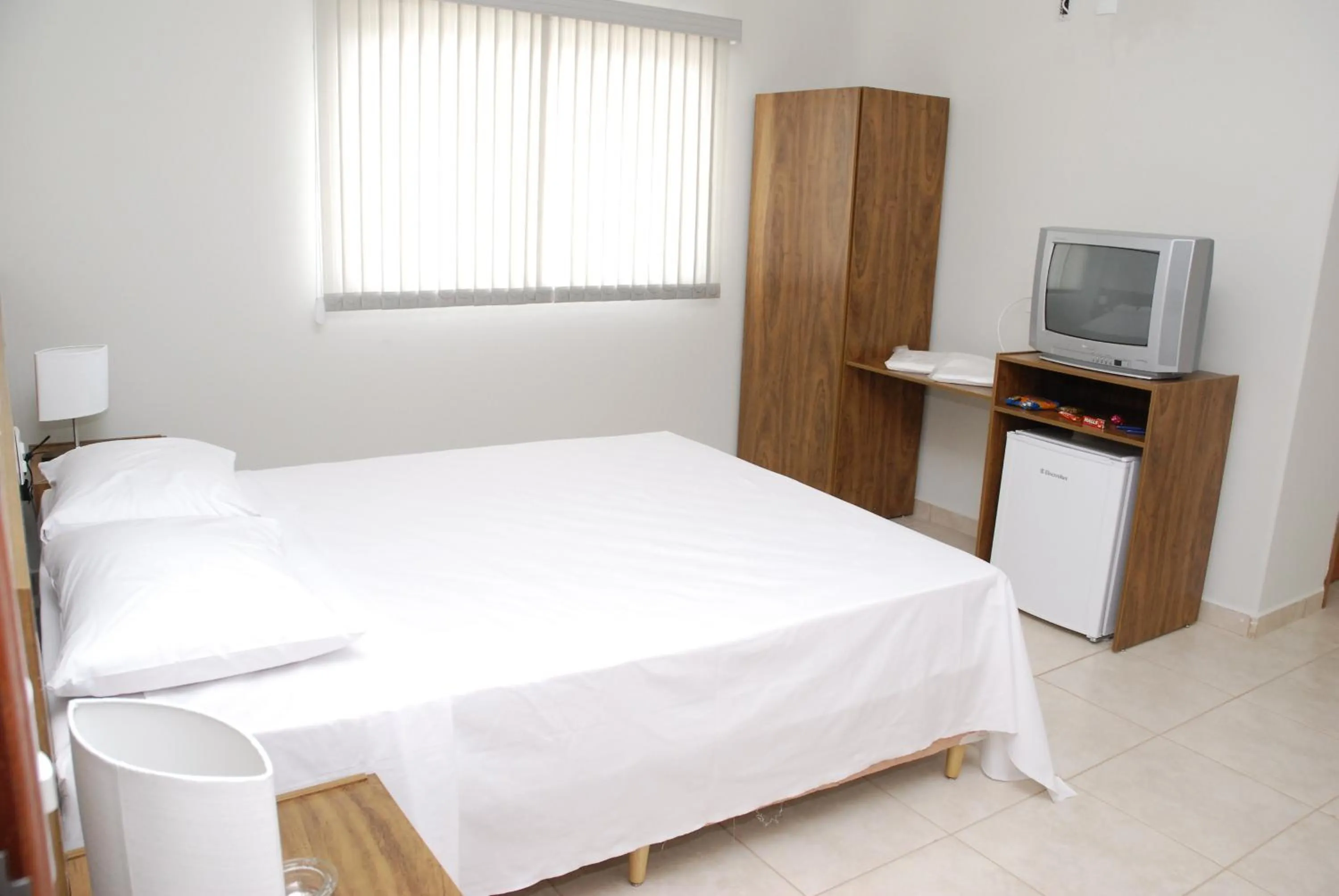 Bed in Monte Castro Executive Hotel