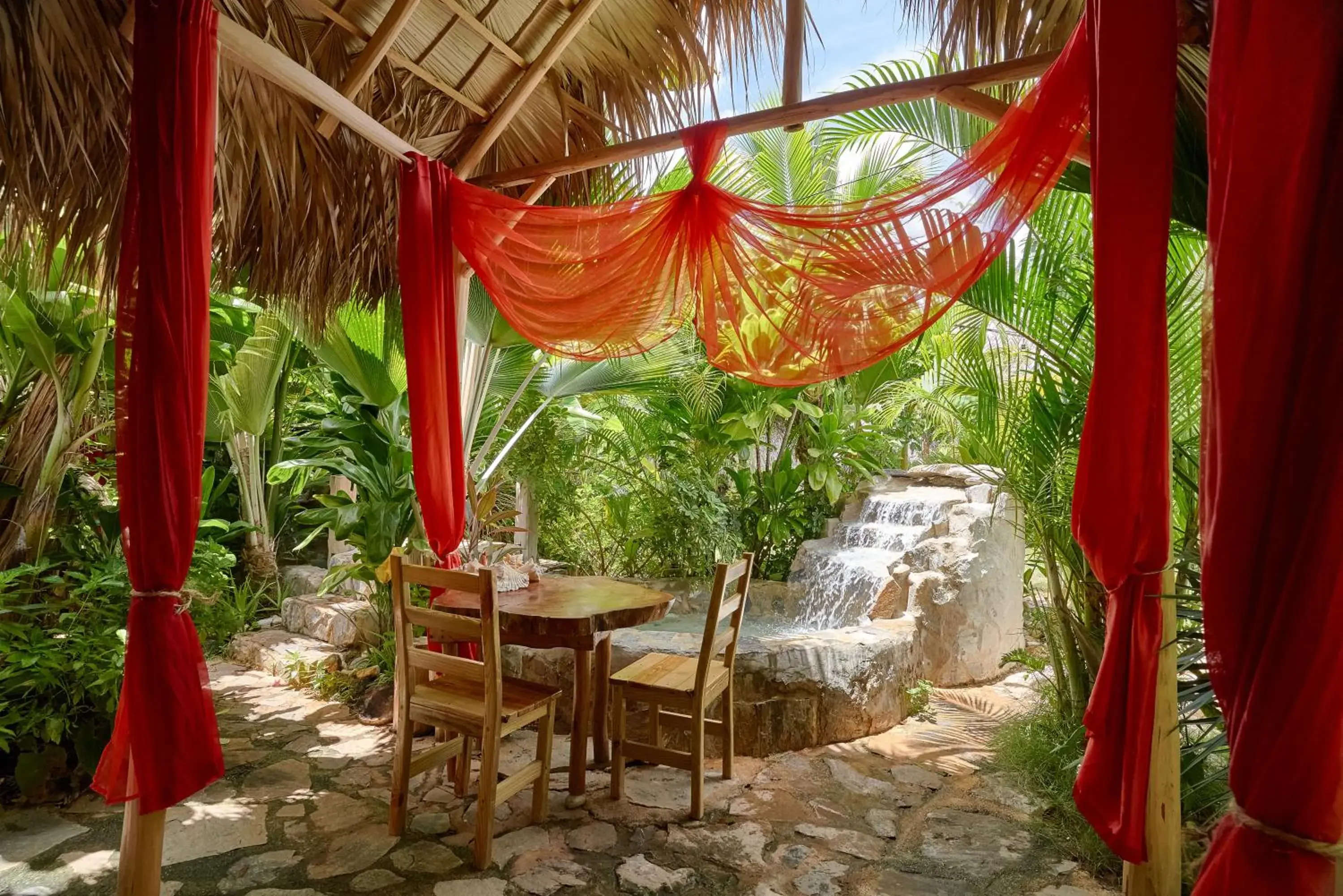 Deluxe Bungalow - single occupancy in CHALET TROPICAL Hotel & Restaurant-Pizzeria Deluxe Bungalow - single occupancy in CHALET TROPICAL Hotel & Restaurant-Pizzeria