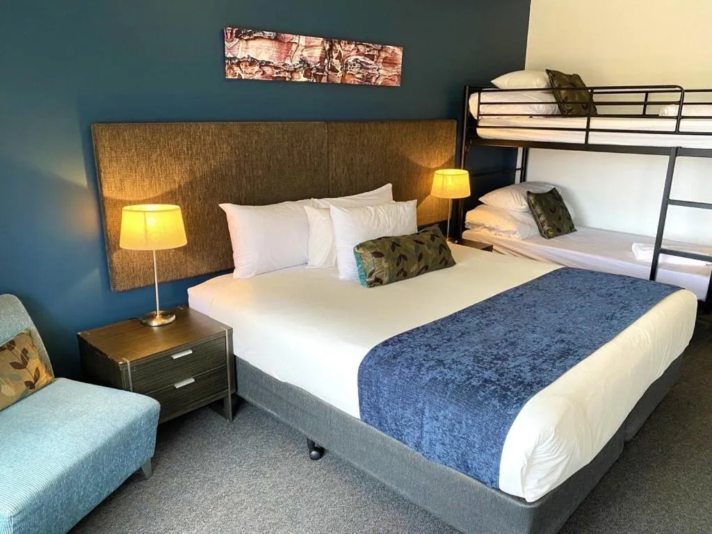 Bed in Golden Age Motor Inn