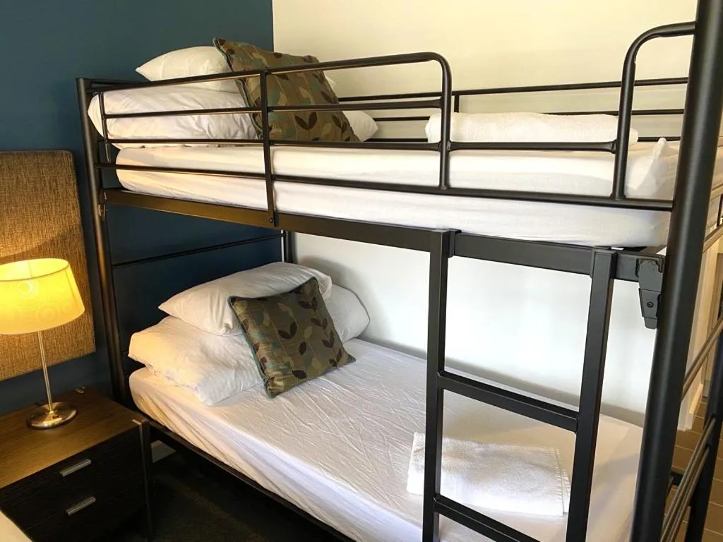 Bed in Golden Age Motor Inn