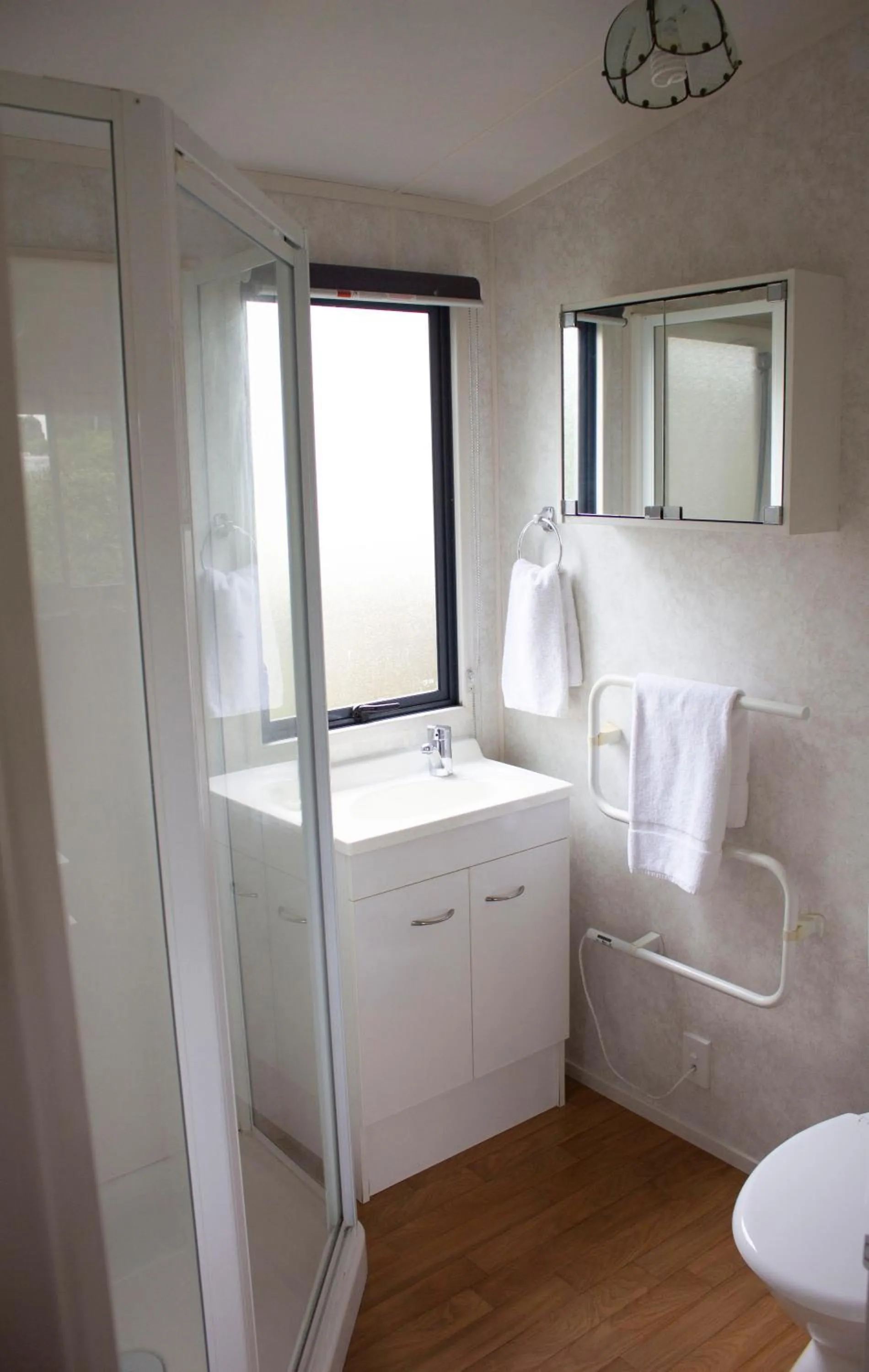 Bathroom, Bed in Whanganui Seaside Holiday Park