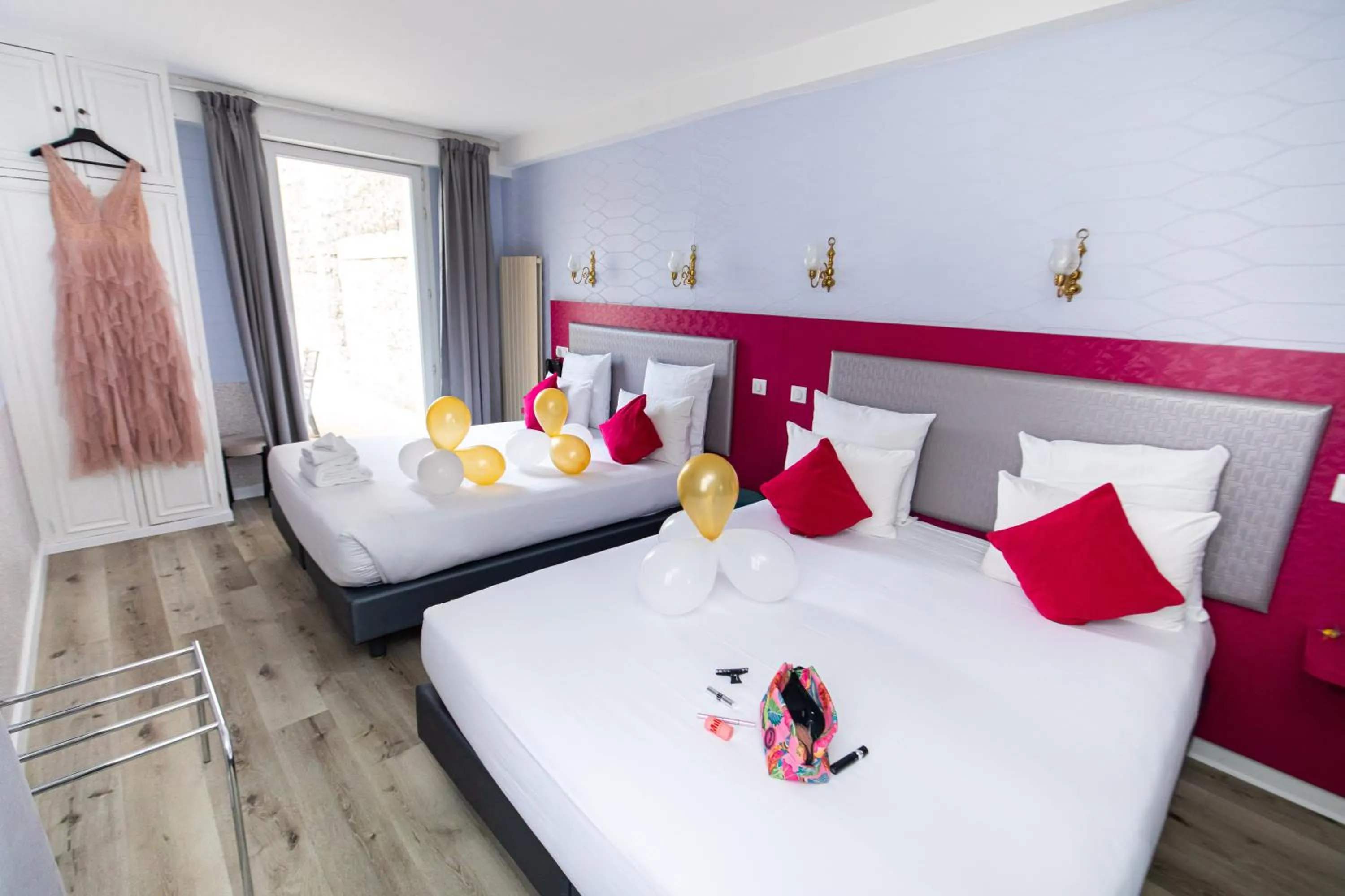 Bed in HOTEL DE PARIS MONTPARNASSE