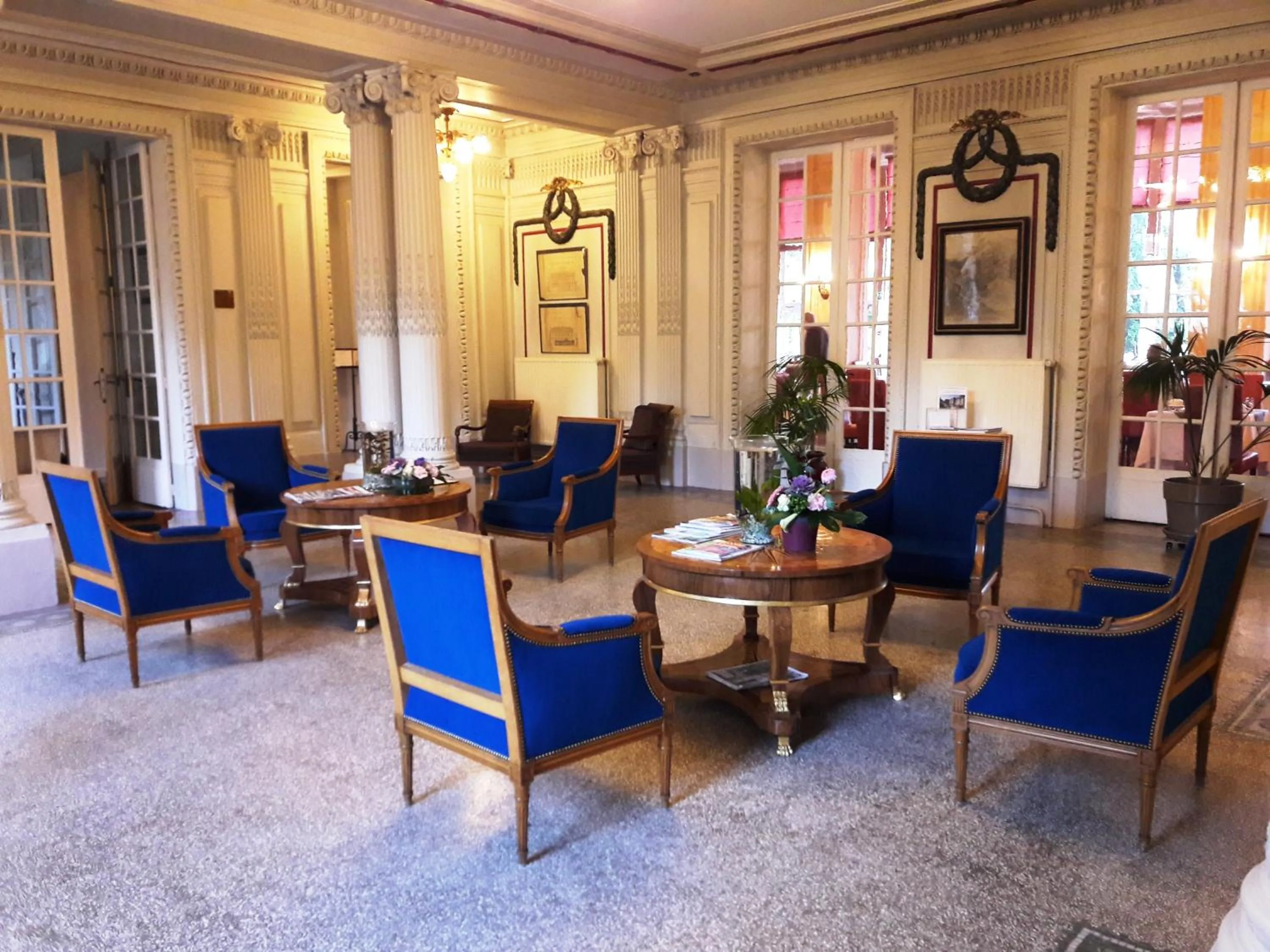 Lobby or reception in Le Grand Hotel de Plombières by Popinns