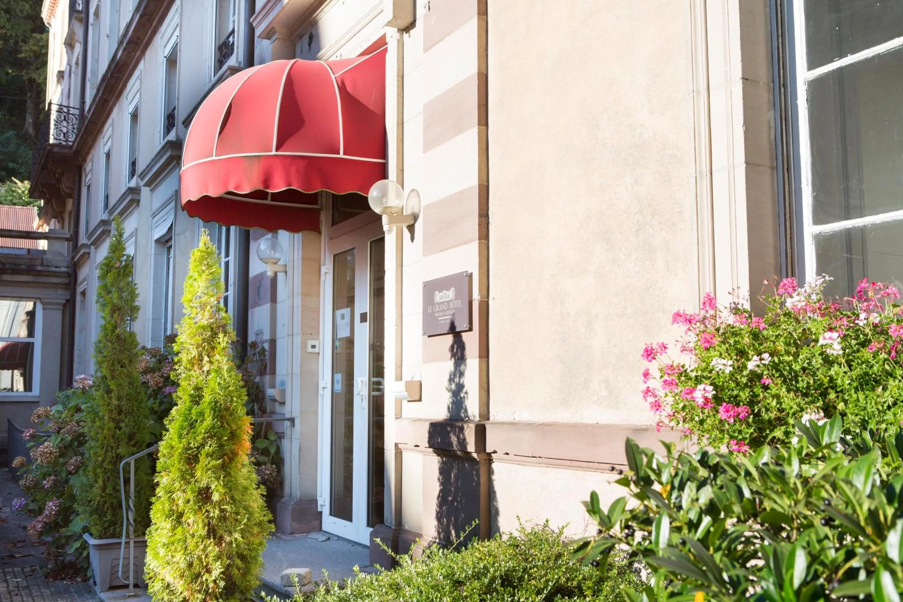 Facade/entrance in Le Grand Hotel de Plombières by Popinns