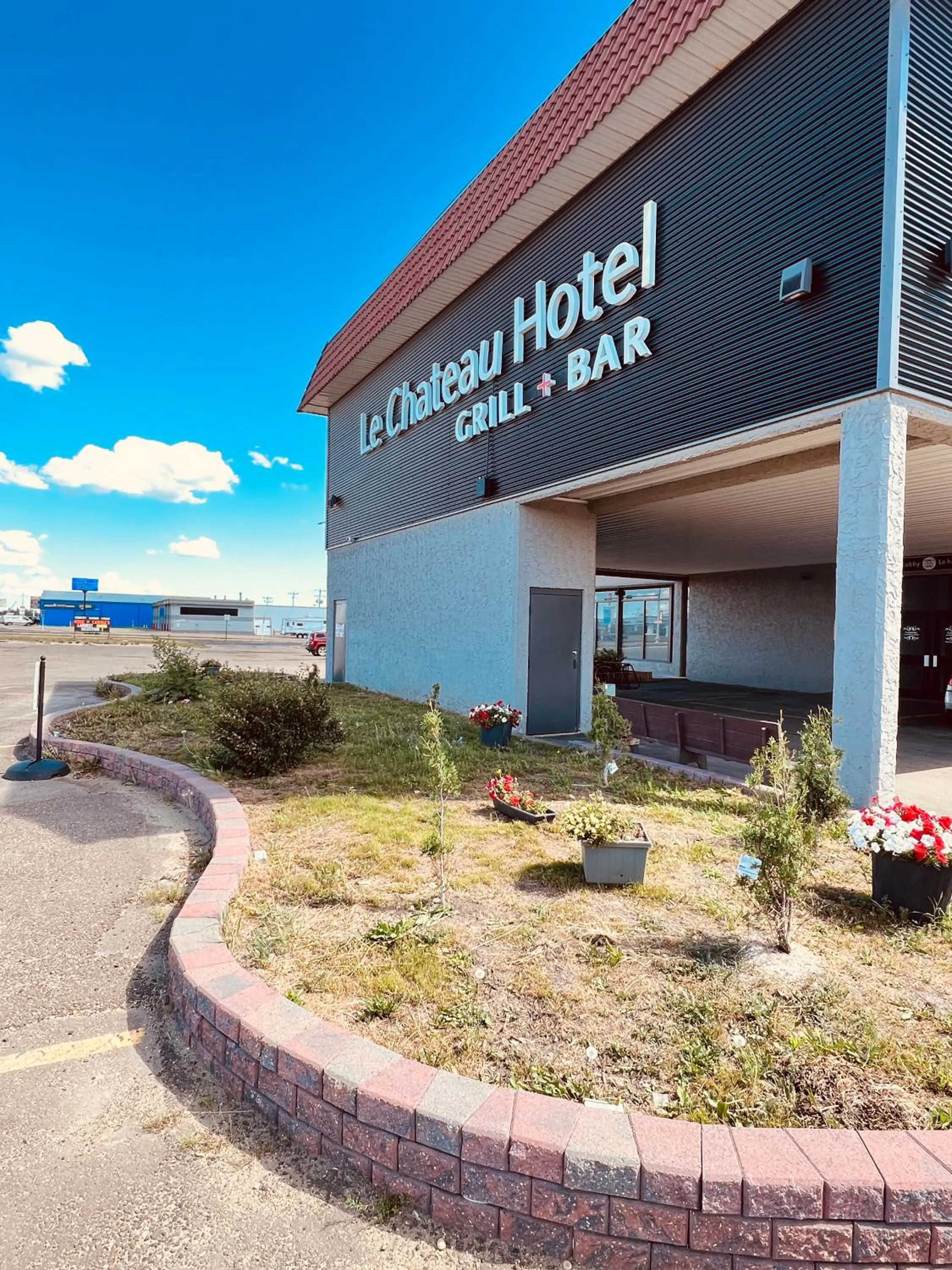 Property building in Camrose Le Chateau Hotel