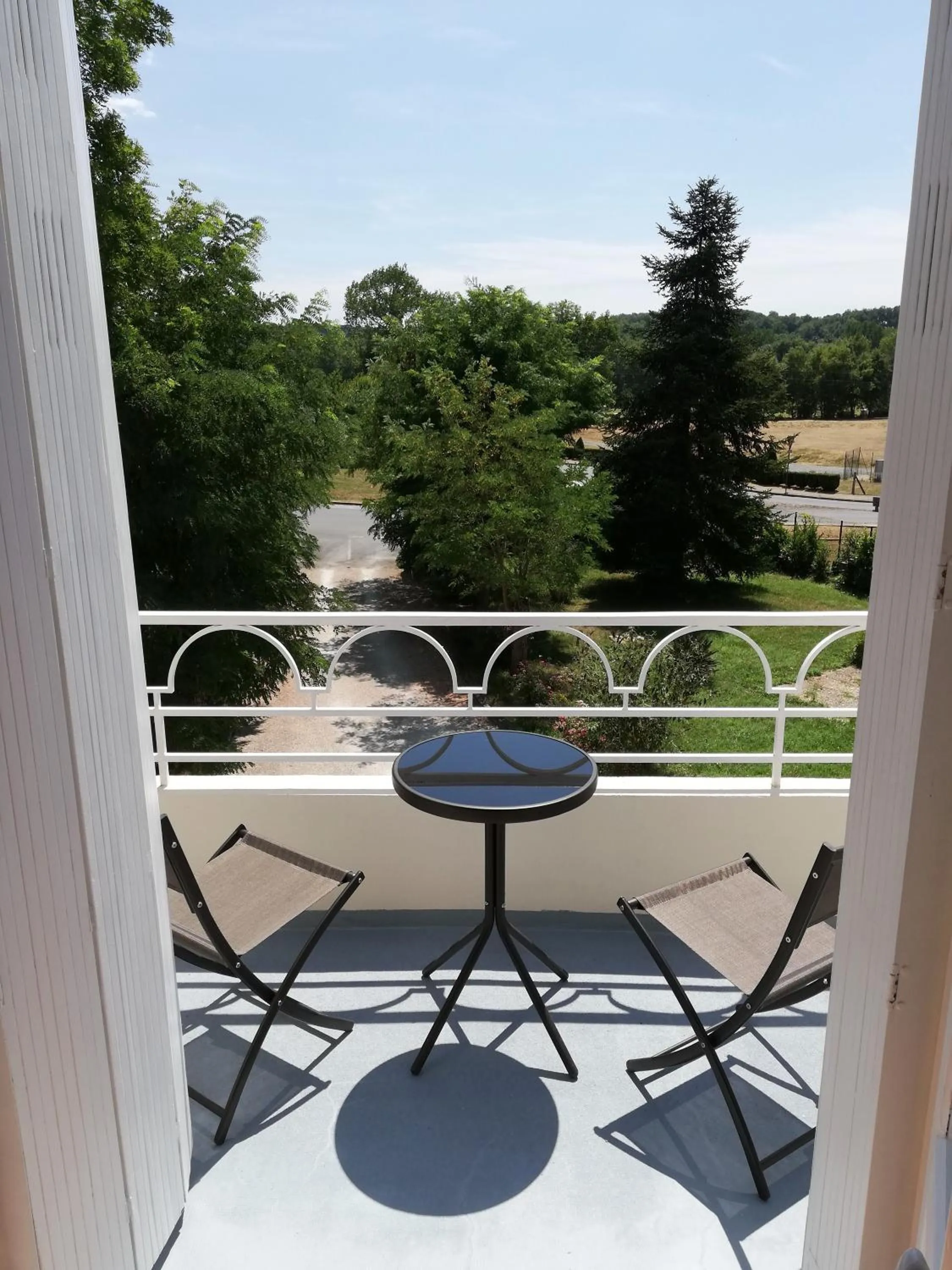 Garden in Vue du Château d'Excideuil en chambres