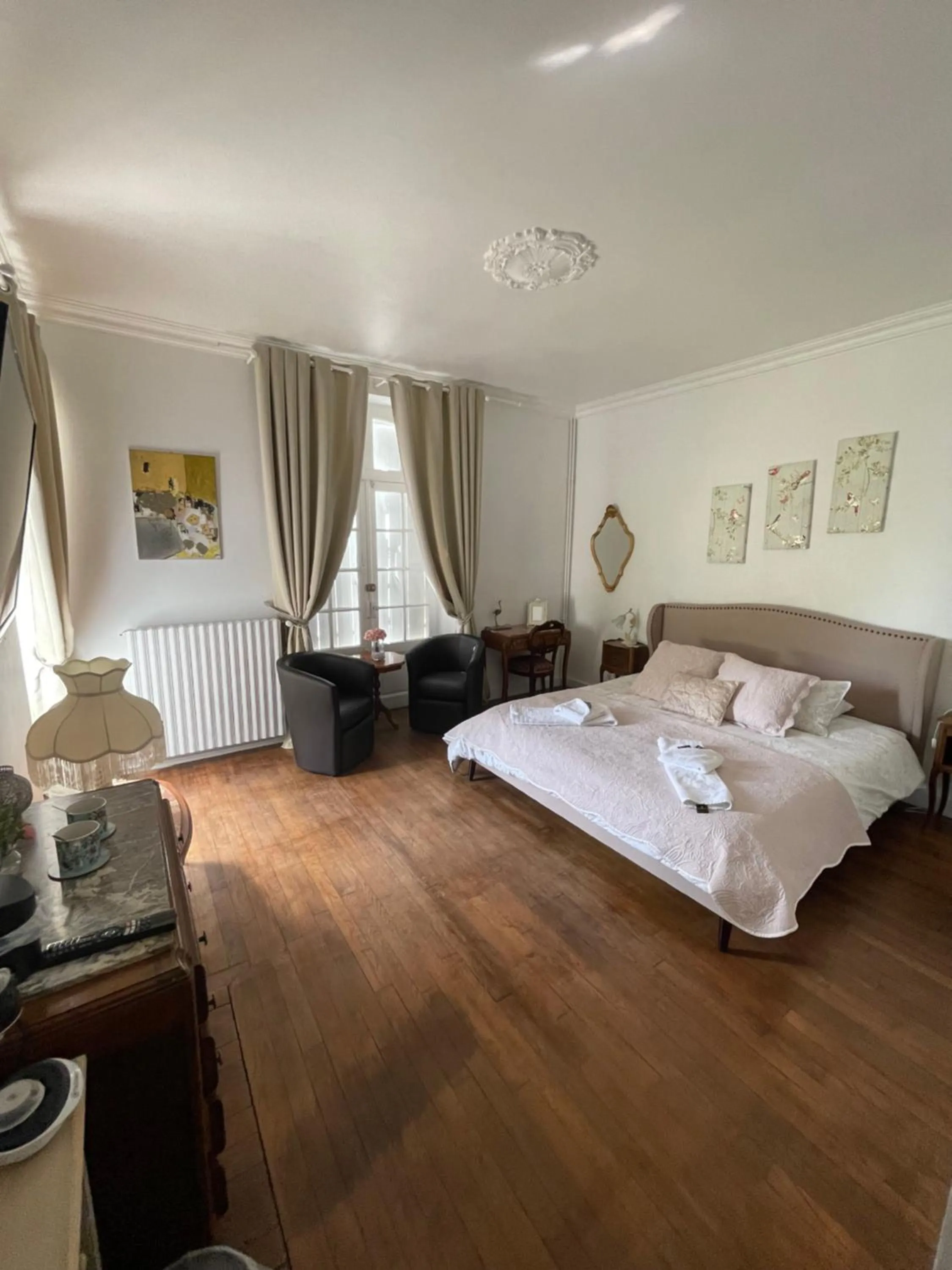 Bed in Vue du Château d'Excideuil en chambres