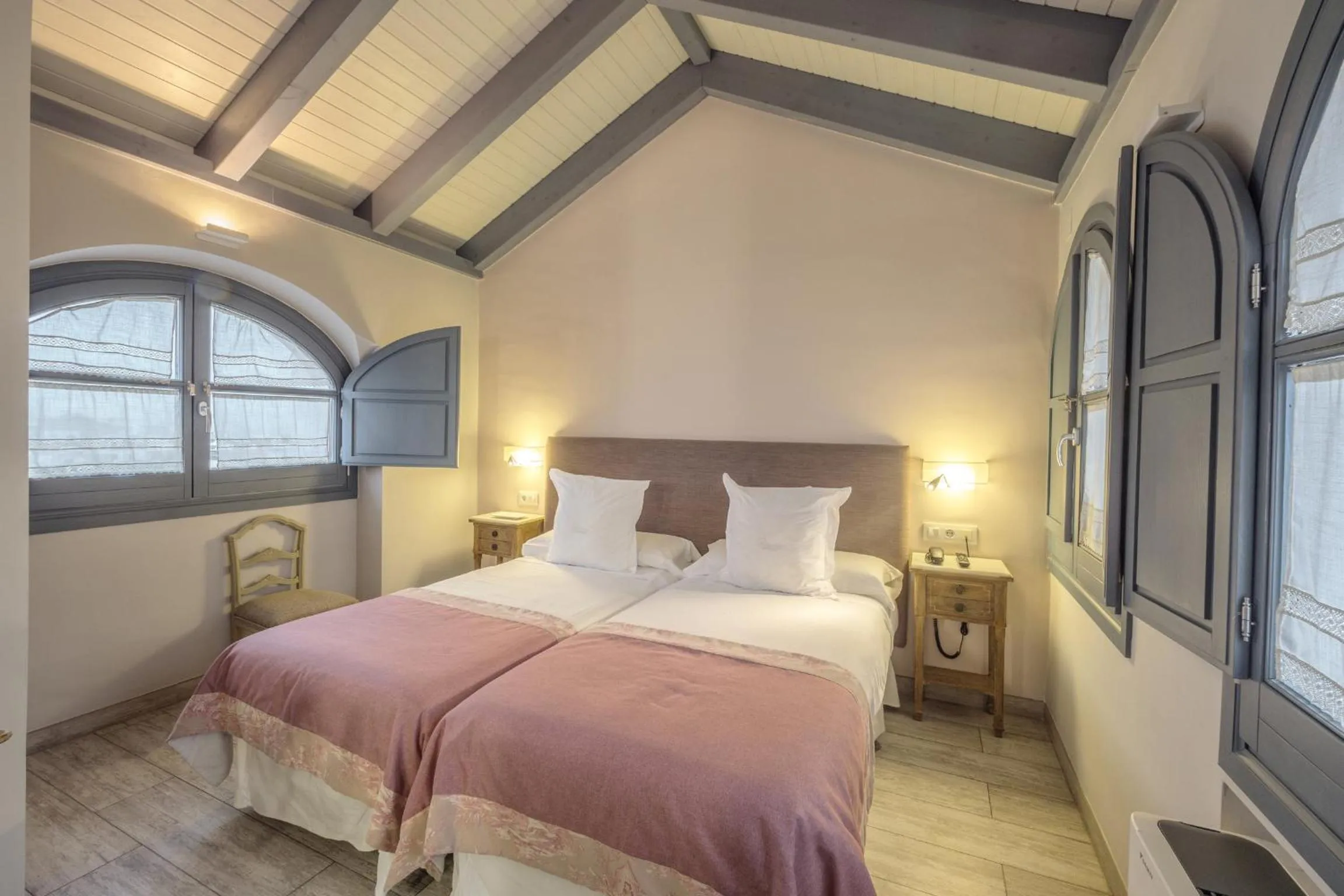 Bed in ApartaSuites Alberca Deluxe