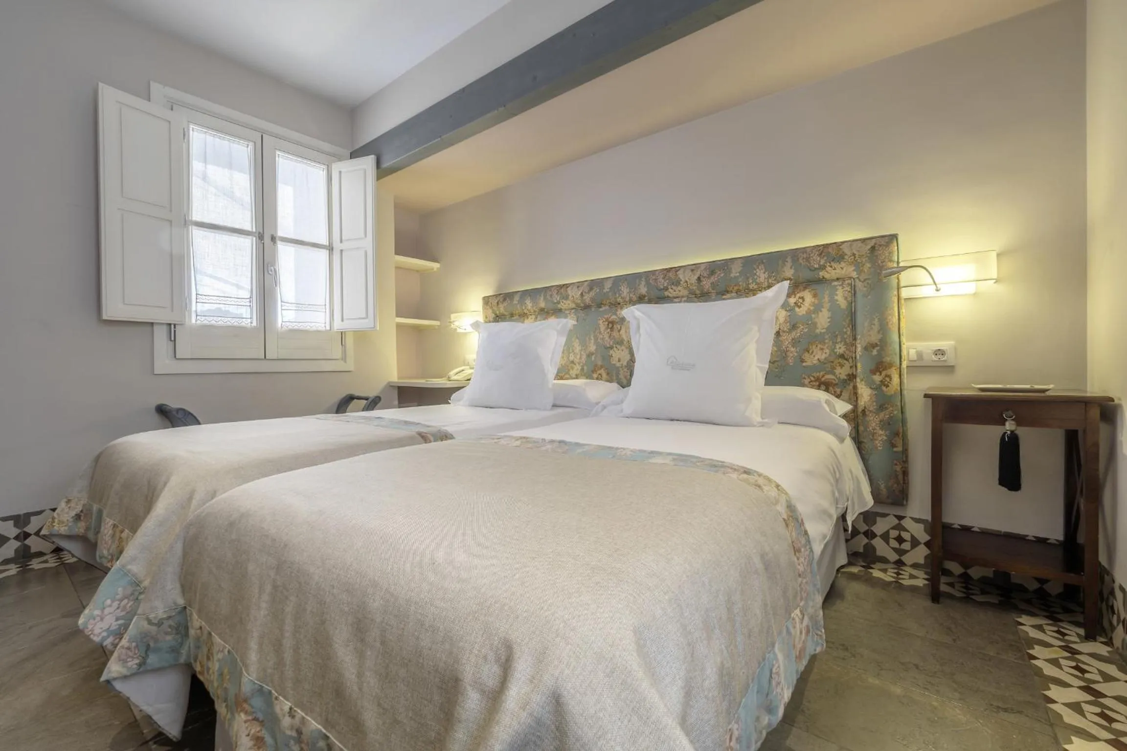 Bed in ApartaSuites Alberca Deluxe