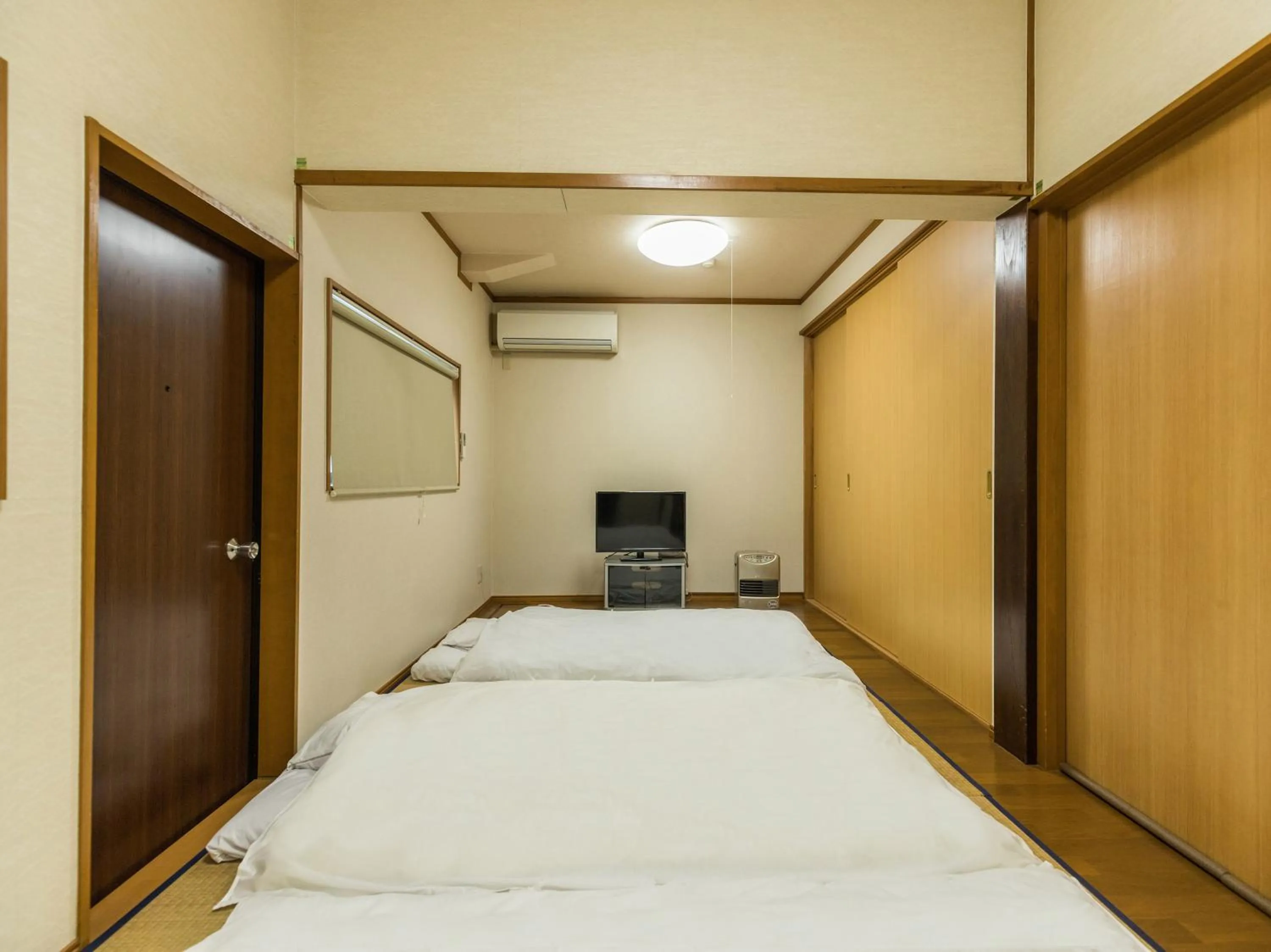 Photo of the whole room, Bed in Tabist Miya Yokkaichi Suizawa
