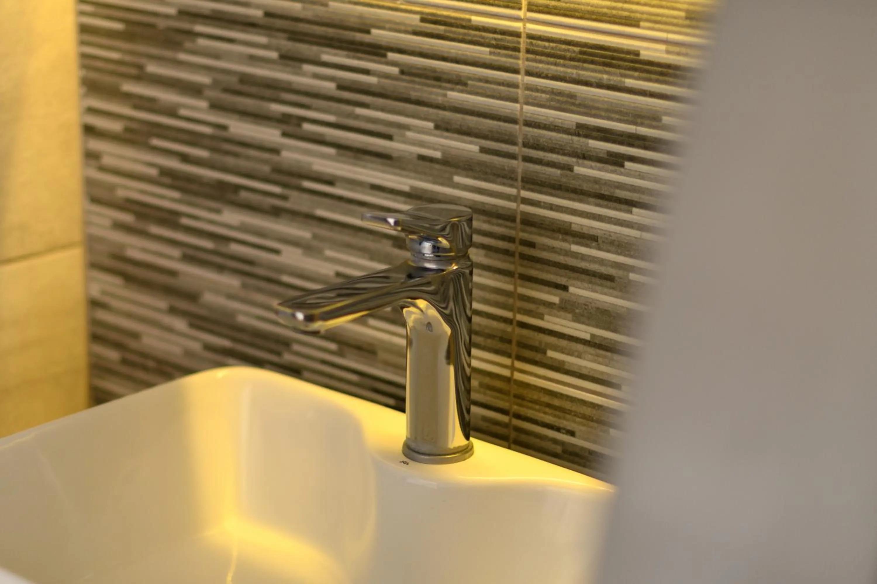 Bathroom in Moonlight Apartments & Suites