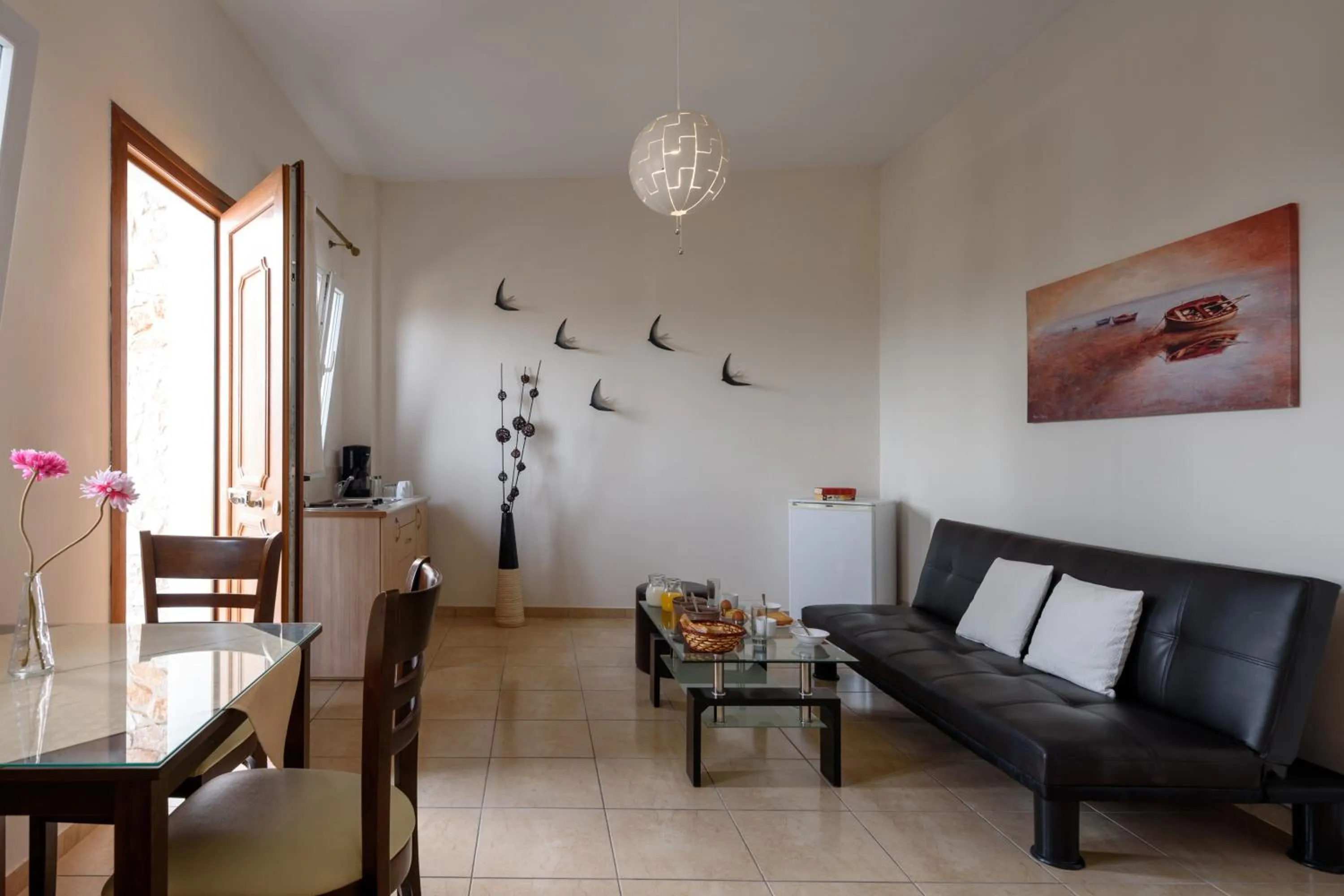 Living room in Moonlight Apartments & Suites