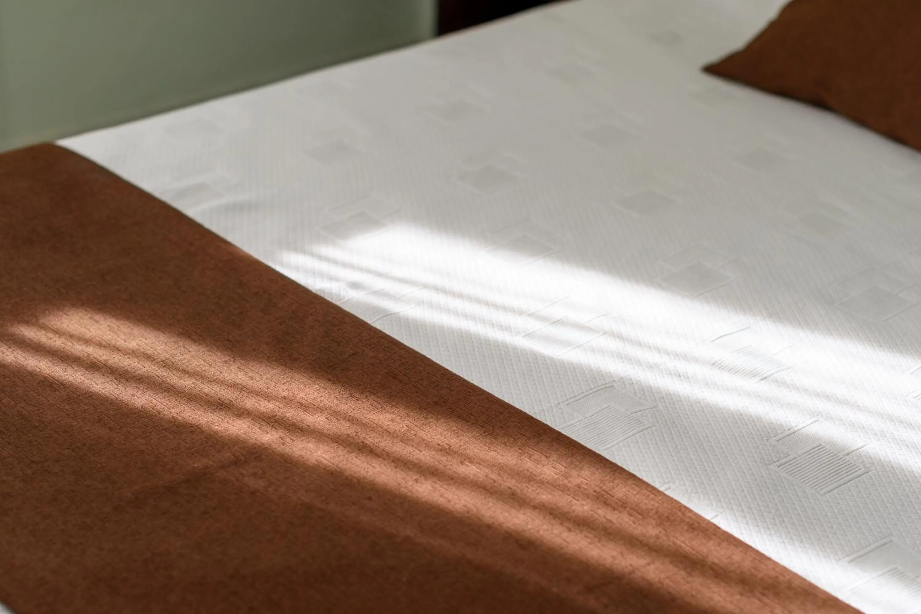 Summer, Bed in Moonlight Apartments & Suites