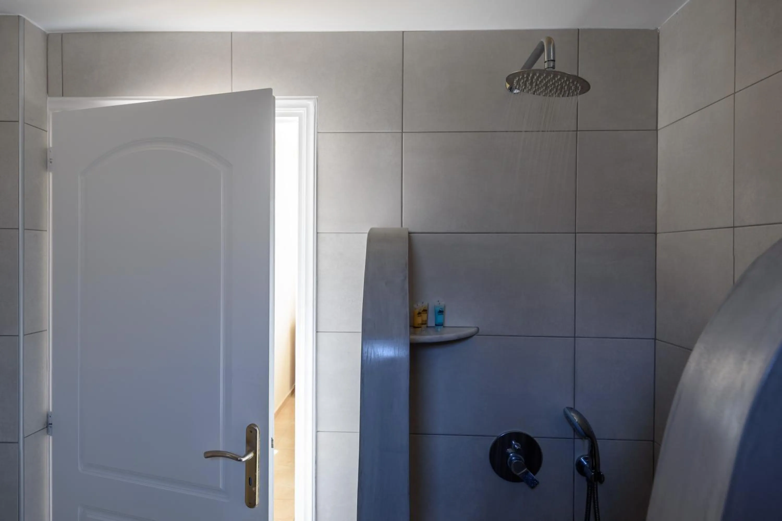 Bathroom in Moonlight Apartments & Suites