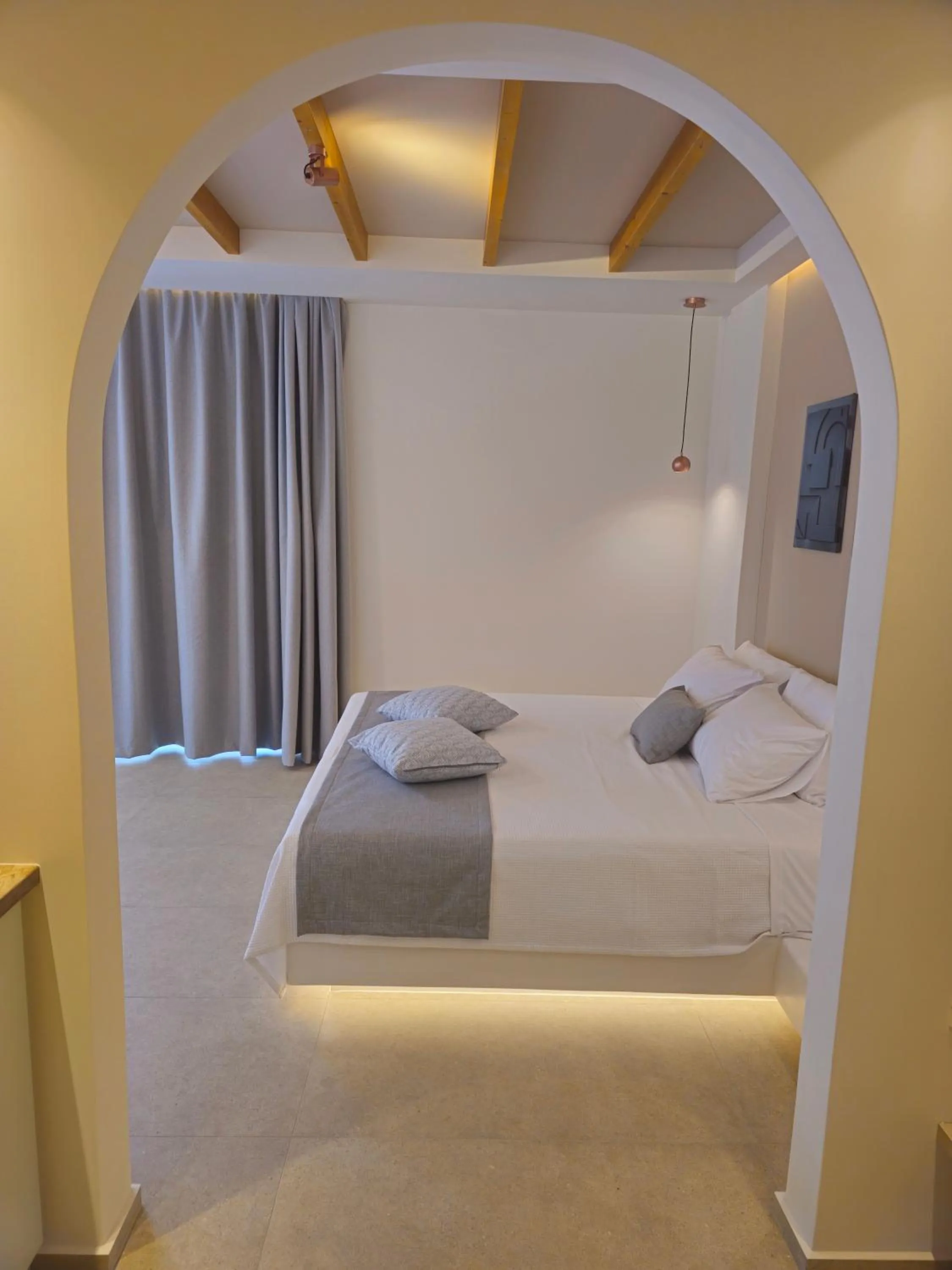 Bedroom, Bed in Moonlight Apartments & Suites