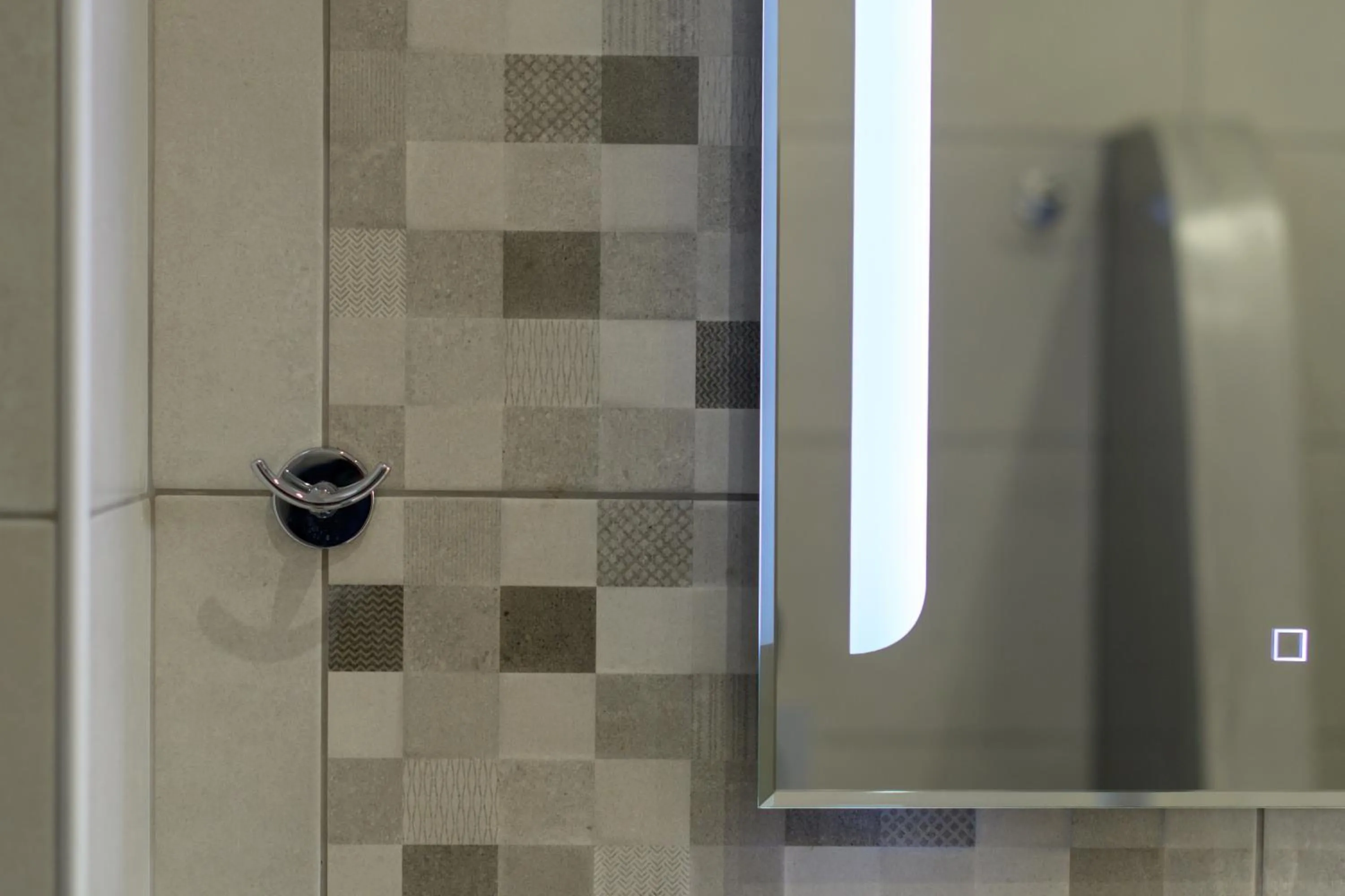 Bathroom in Moonlight Apartments & Suites