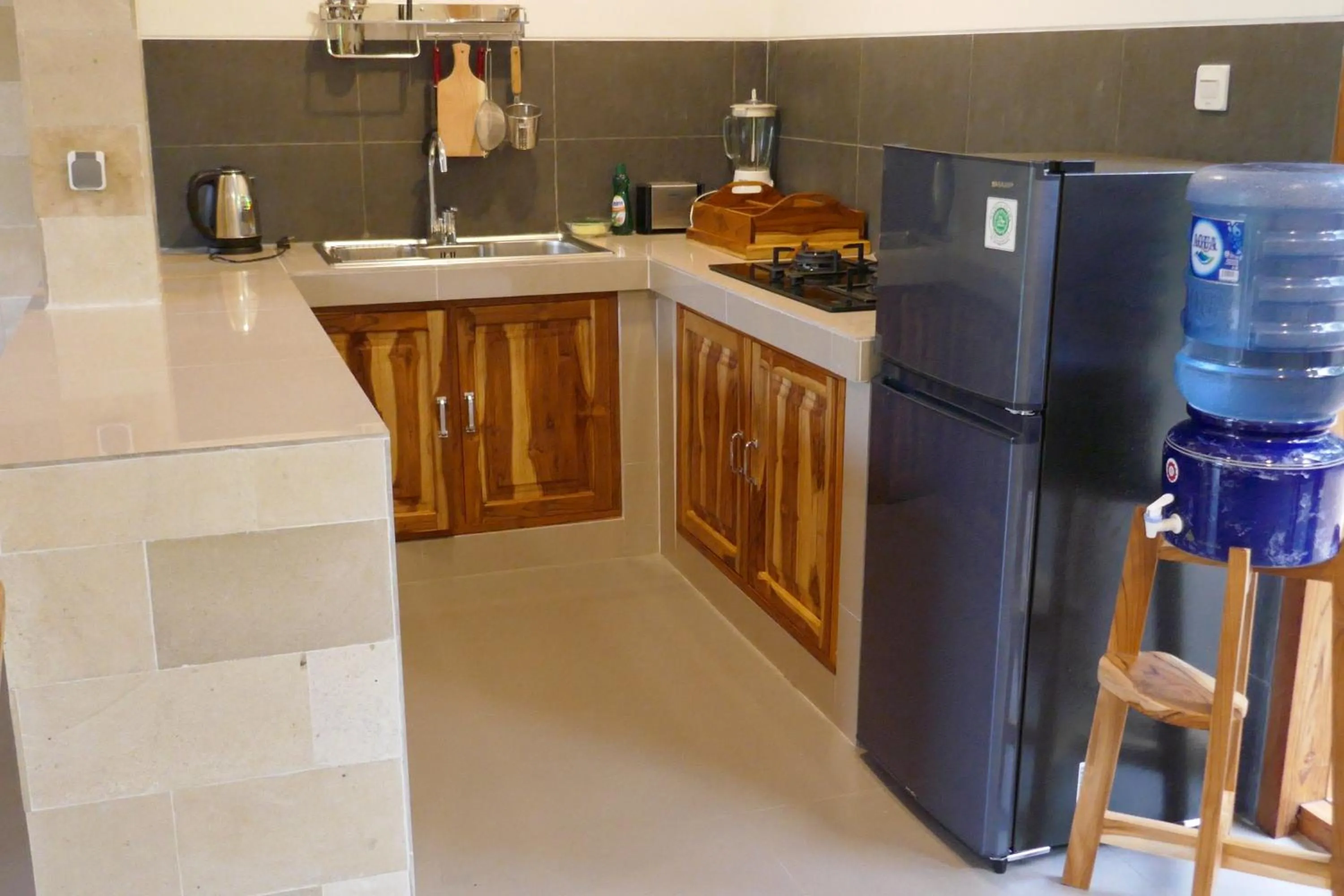 Kitchen or kitchenette in Palm Beach Villas Bali