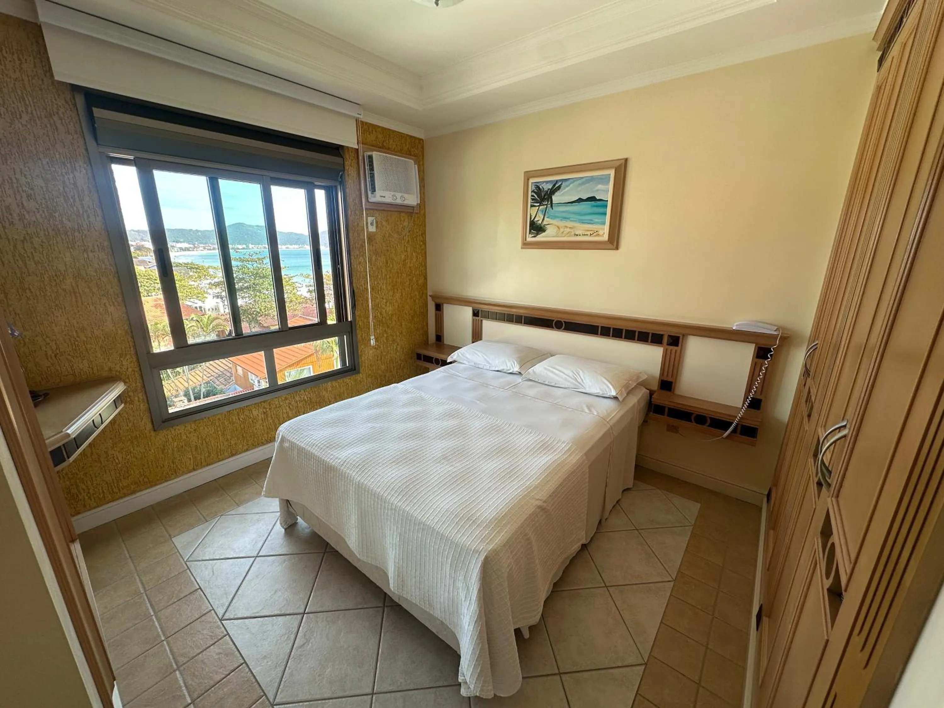 Bed in Golfinhos Apart Hotel