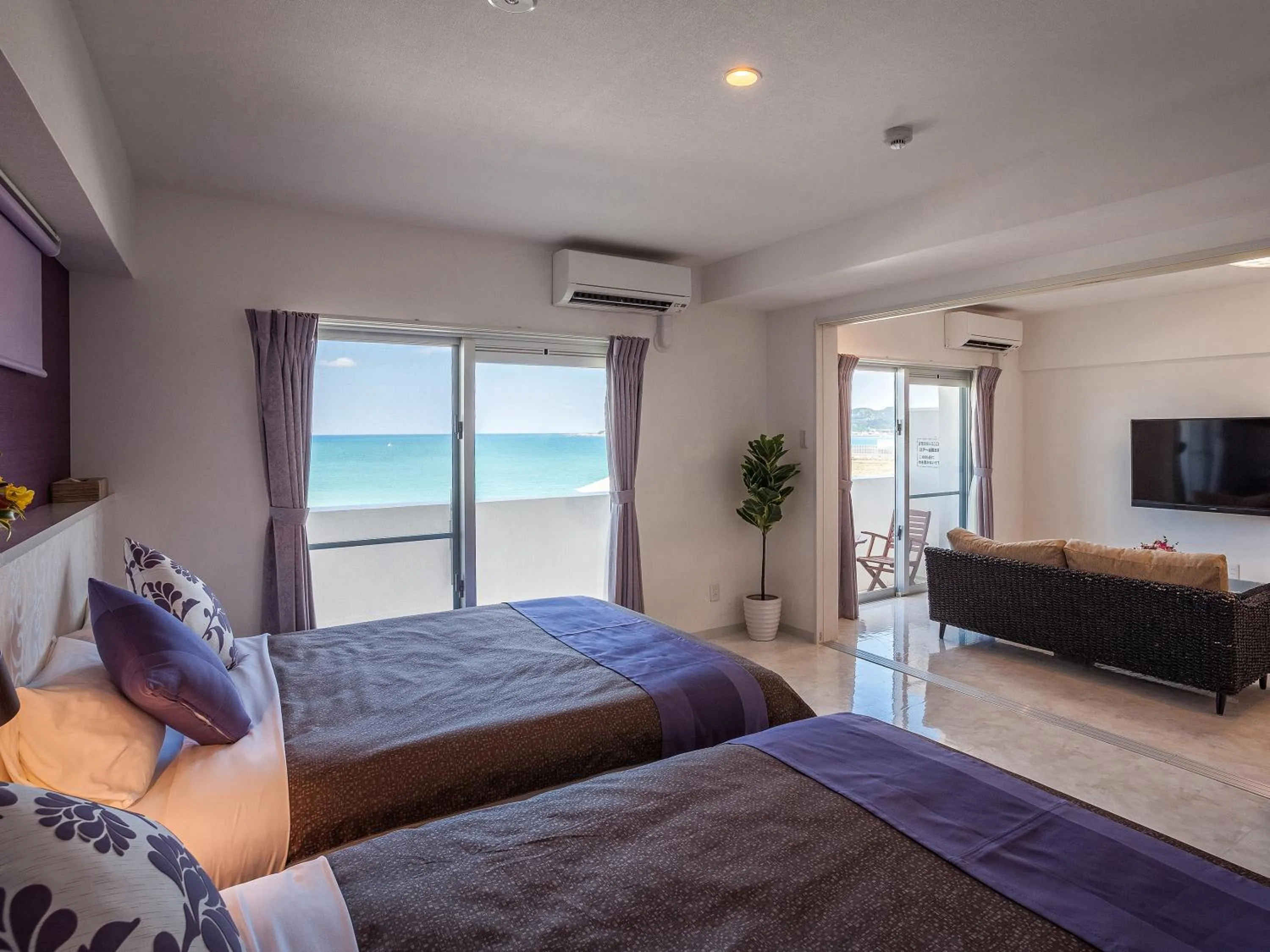 Photo of the whole room, Bed in Yonabaru Hotel SUNRIZE OCEAN