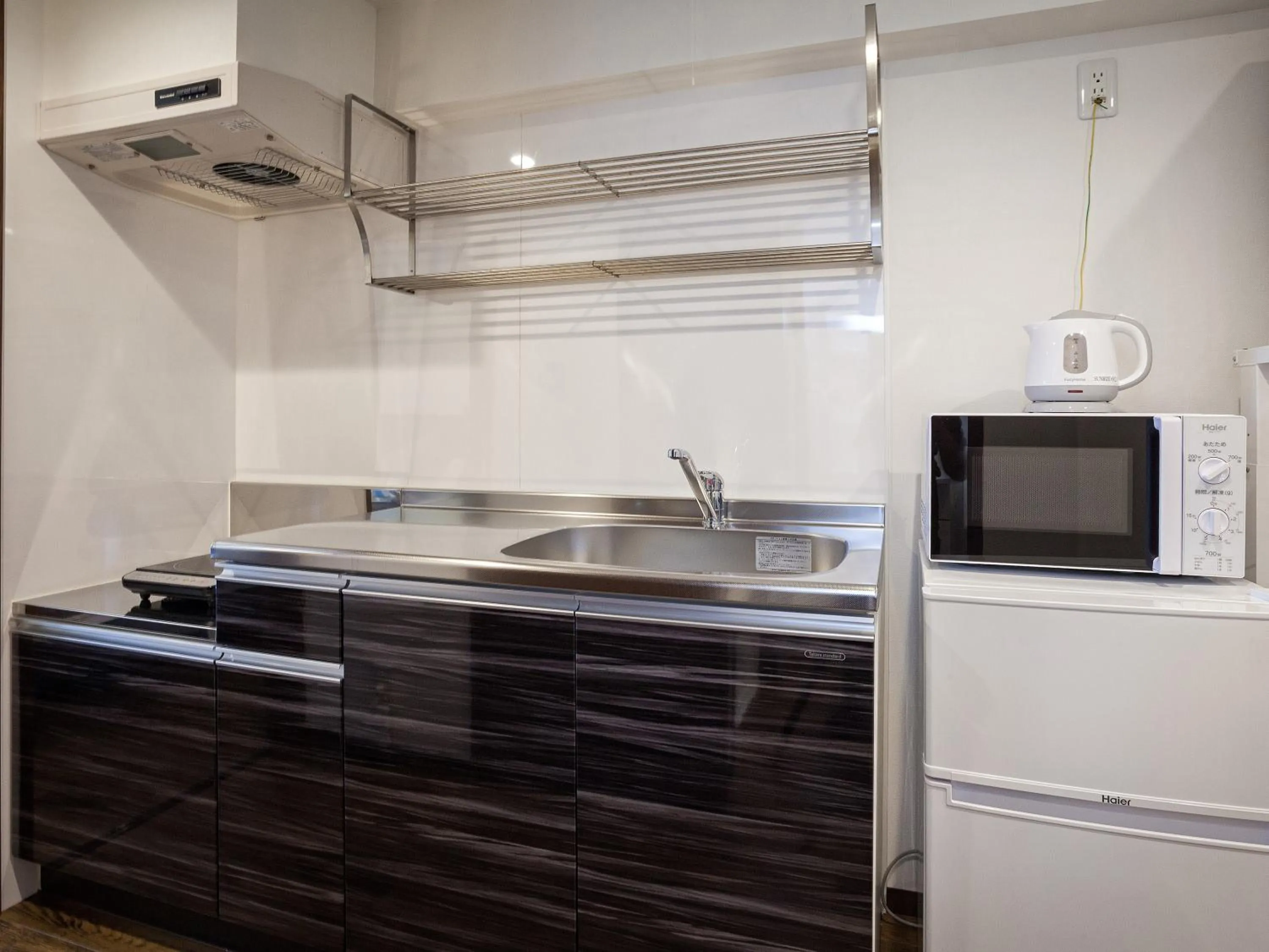 Kitchen or kitchenette in Yonabaru Hotel SUNRIZE OCEAN