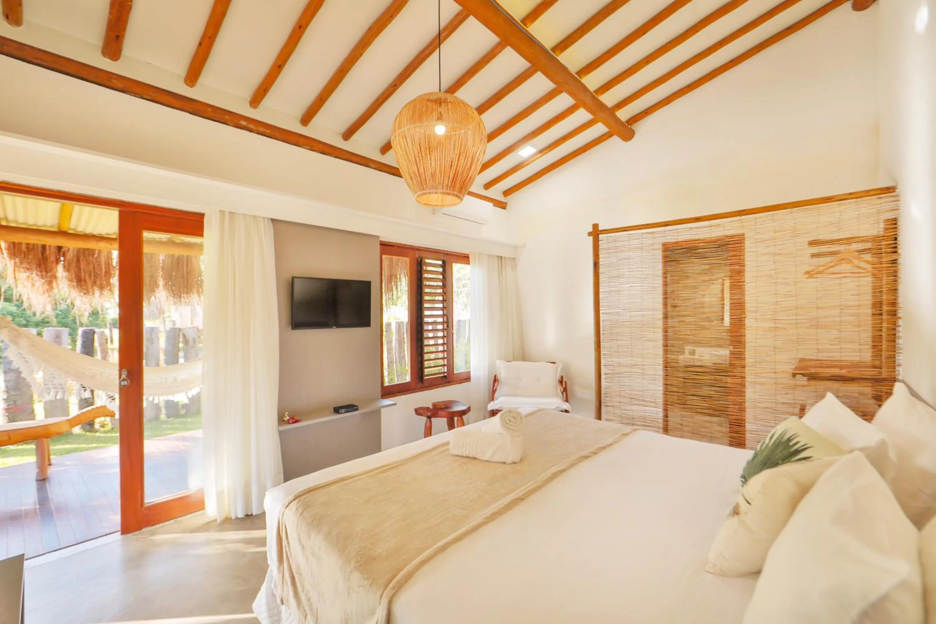 Bed in Pousada Tatuá