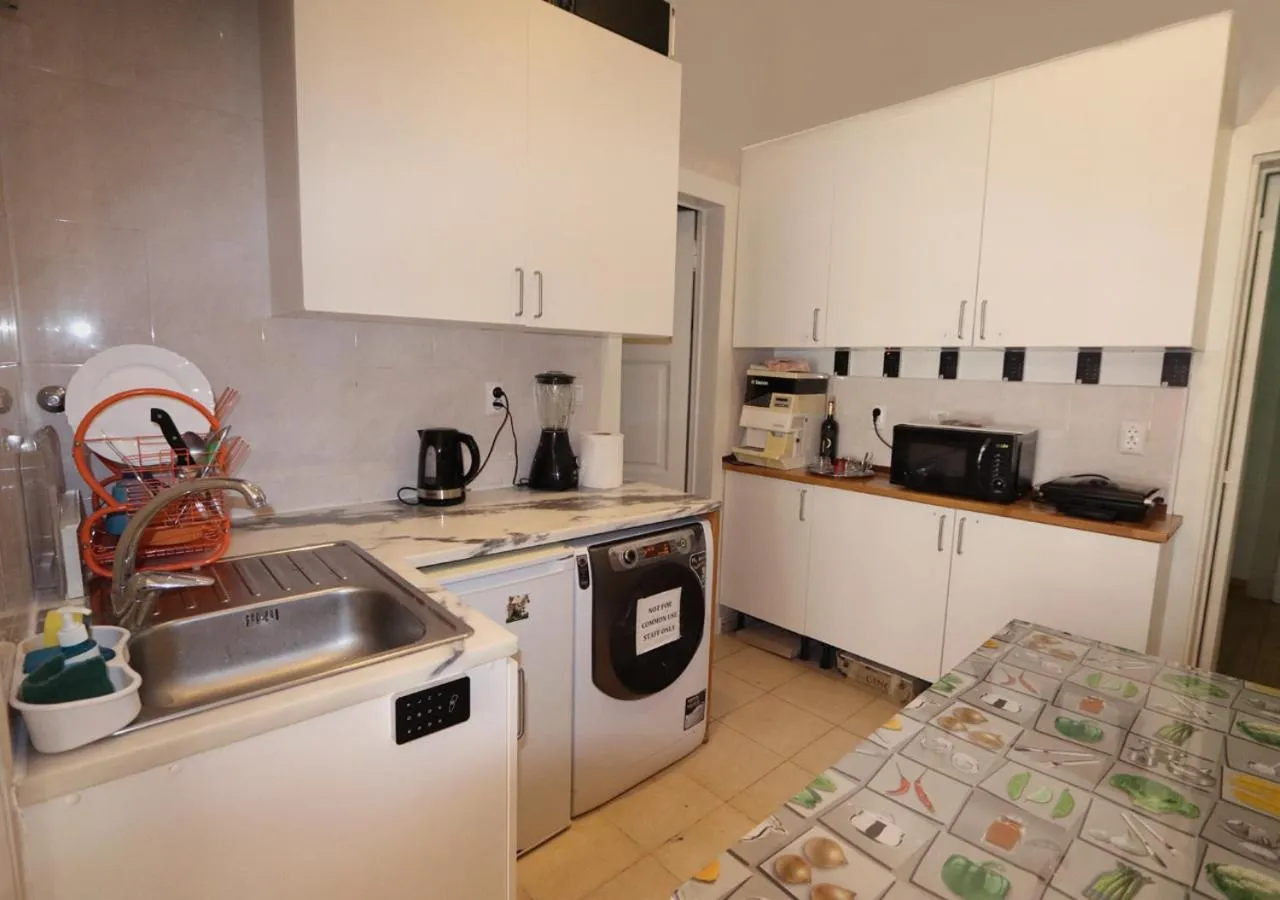 Kitchen or kitchenette in City Center Guest House