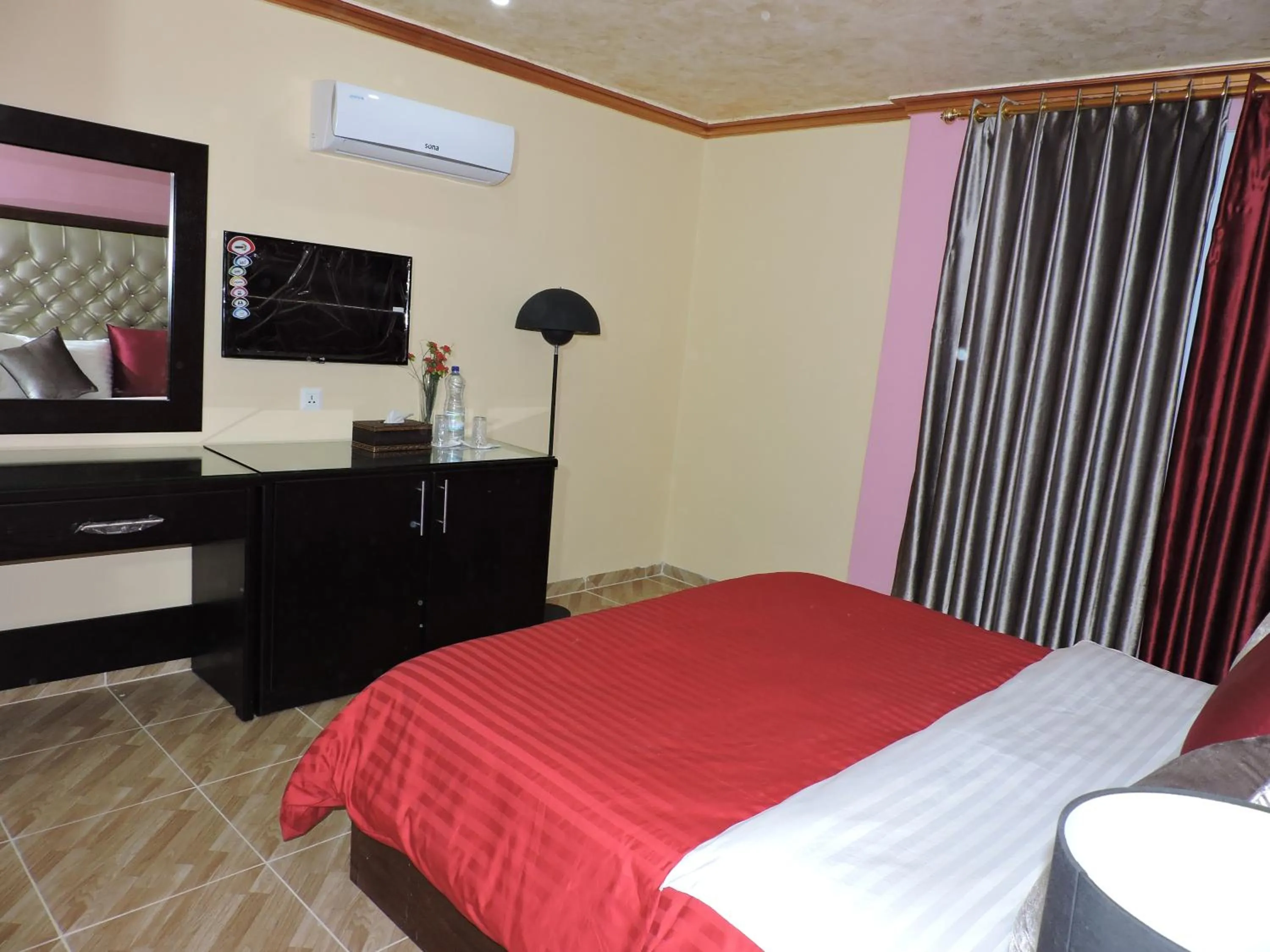 Bed in Valentine Inn Luxury