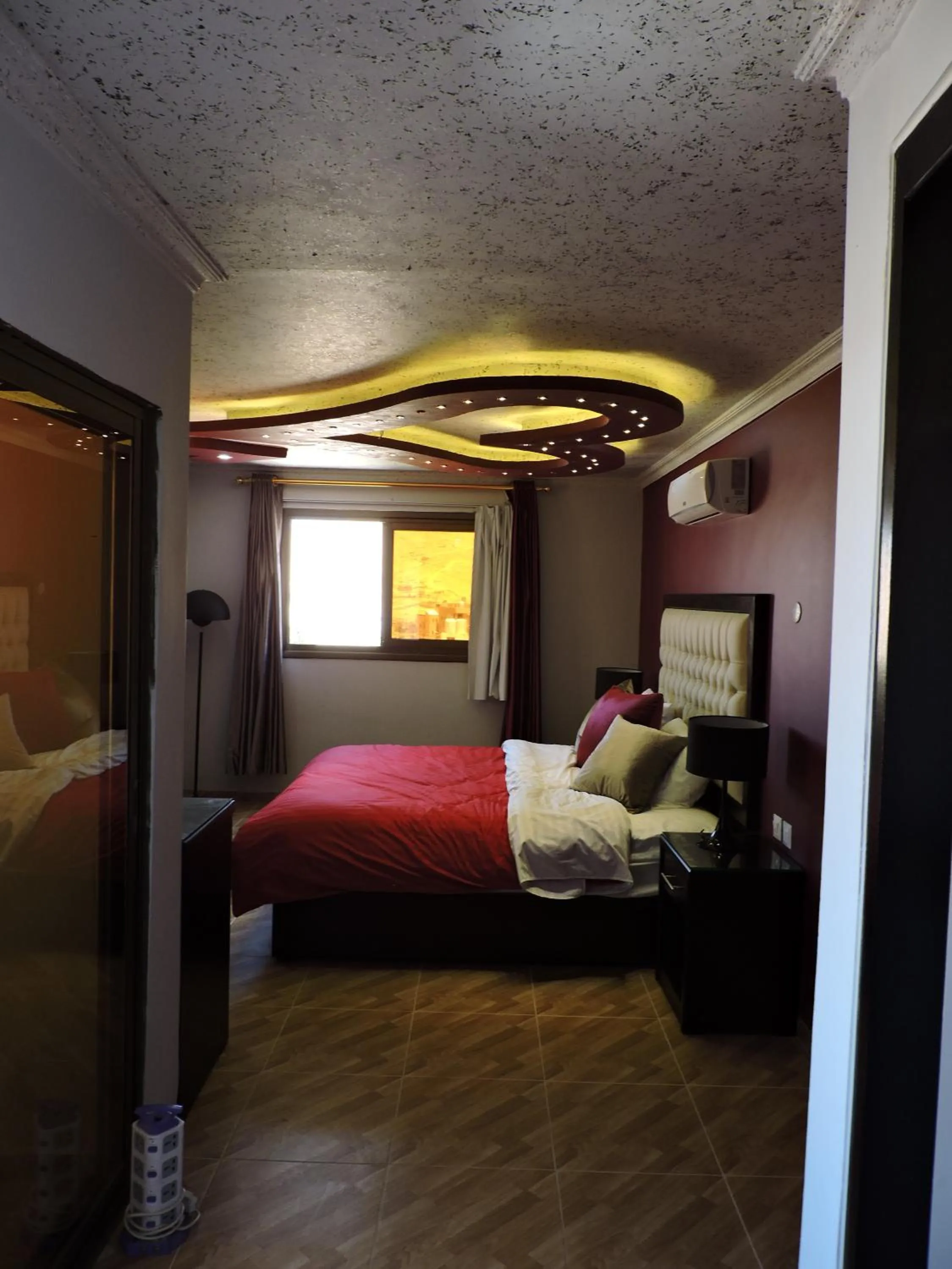 Bed in Valentine Inn Luxury