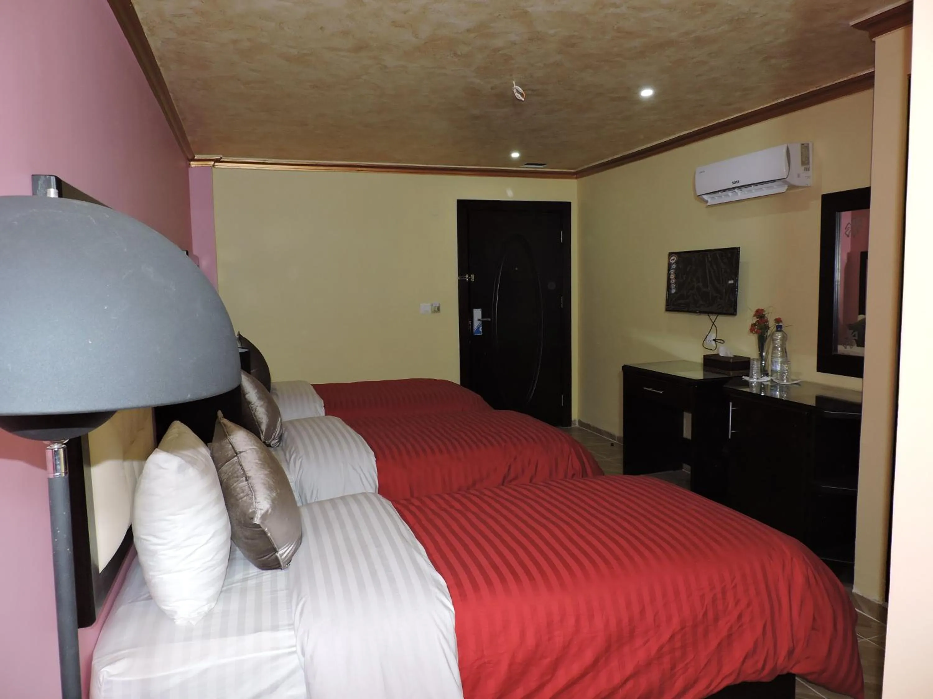 Bed in Valentine Inn Luxury