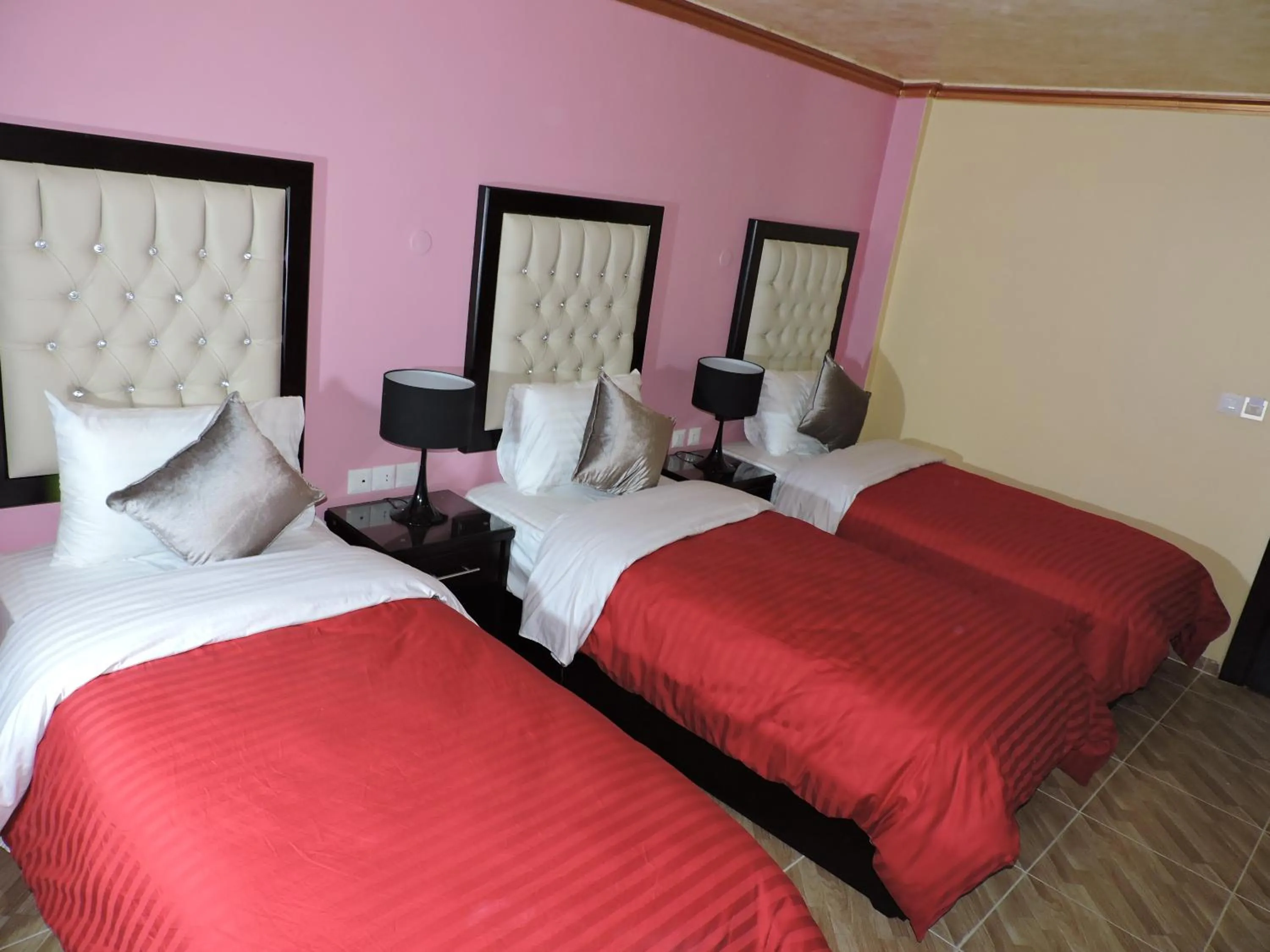 Bed in Valentine Inn Luxury