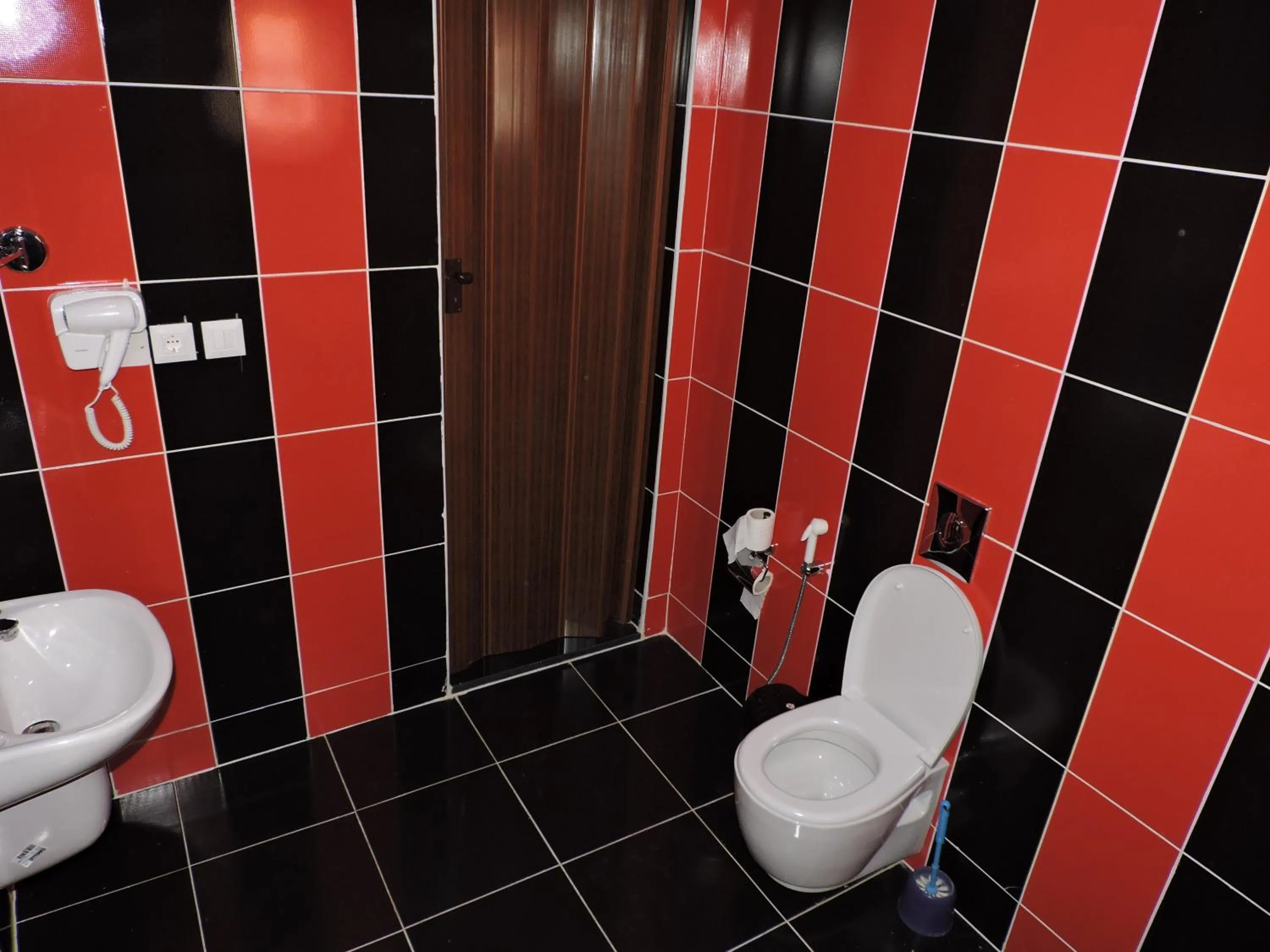 Toilet in Valentine Inn Luxury