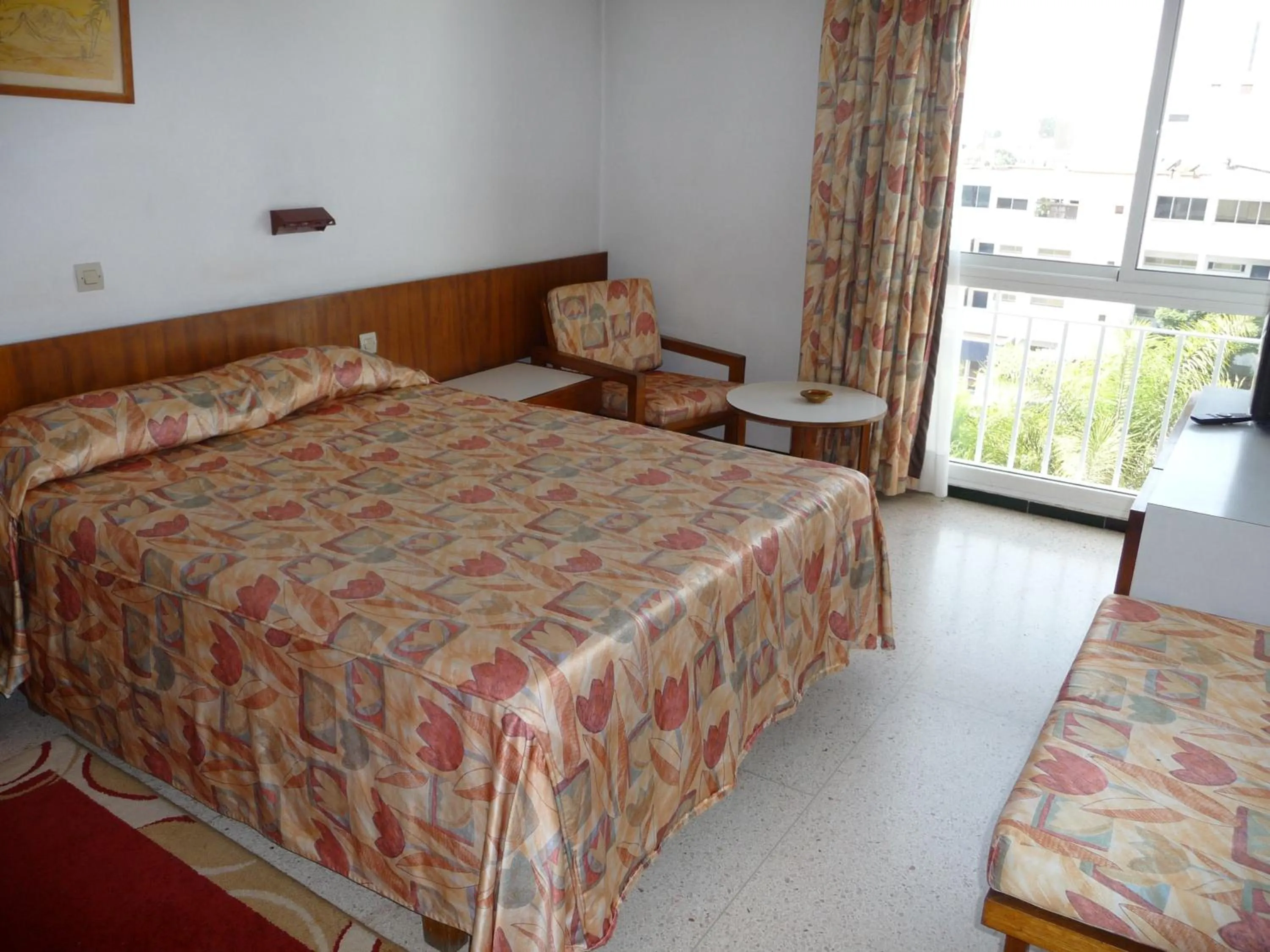 Bed in HOTEL KAMAL CITY CENTER