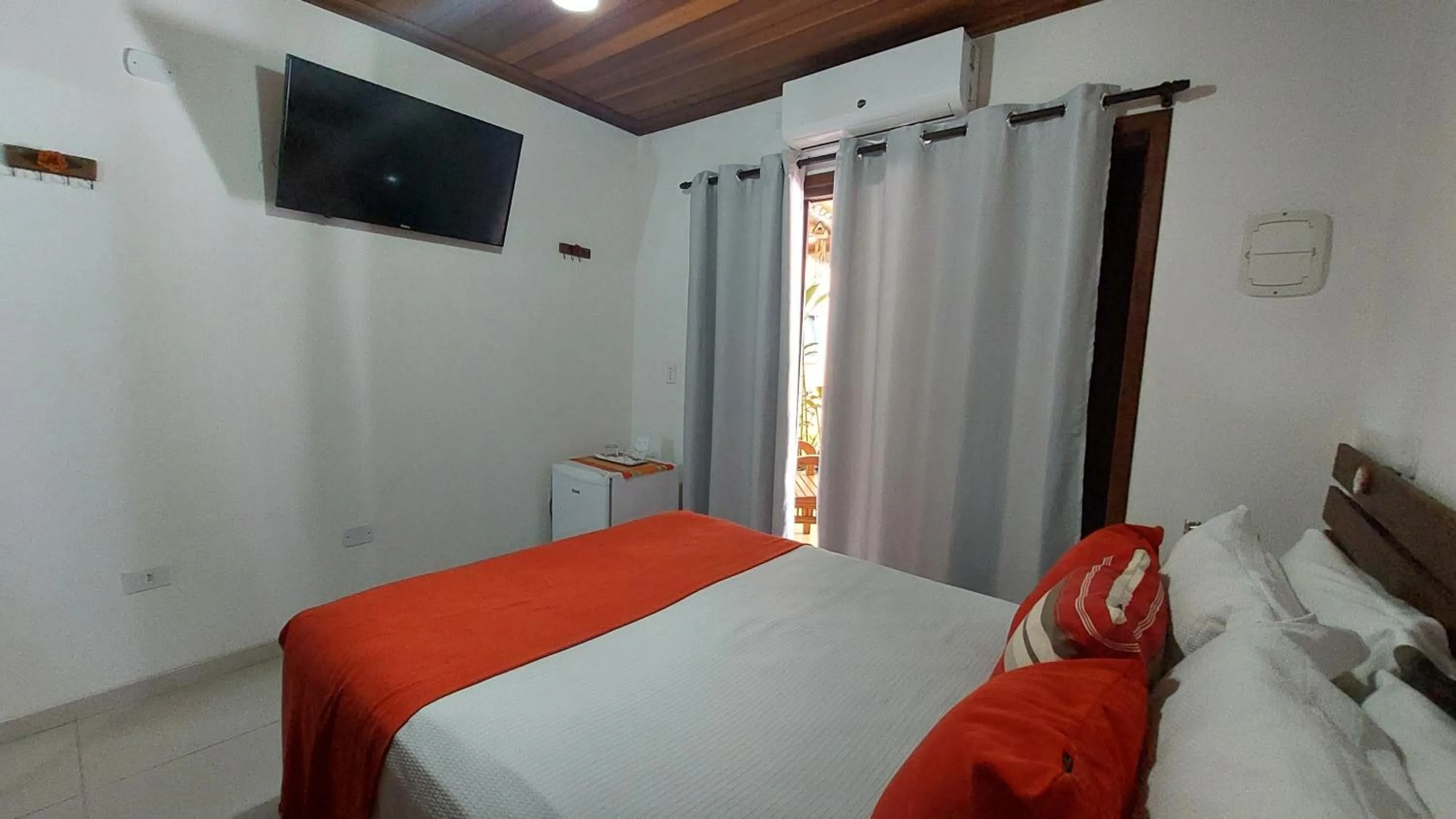 Bed in Pousada Canoa Caiçara Ilhabela