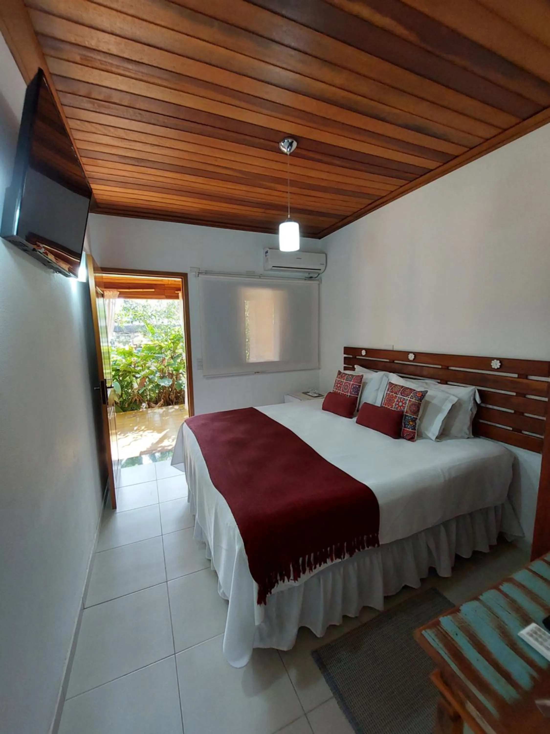 Bed in Pousada Canoa Caiçara Ilhabela