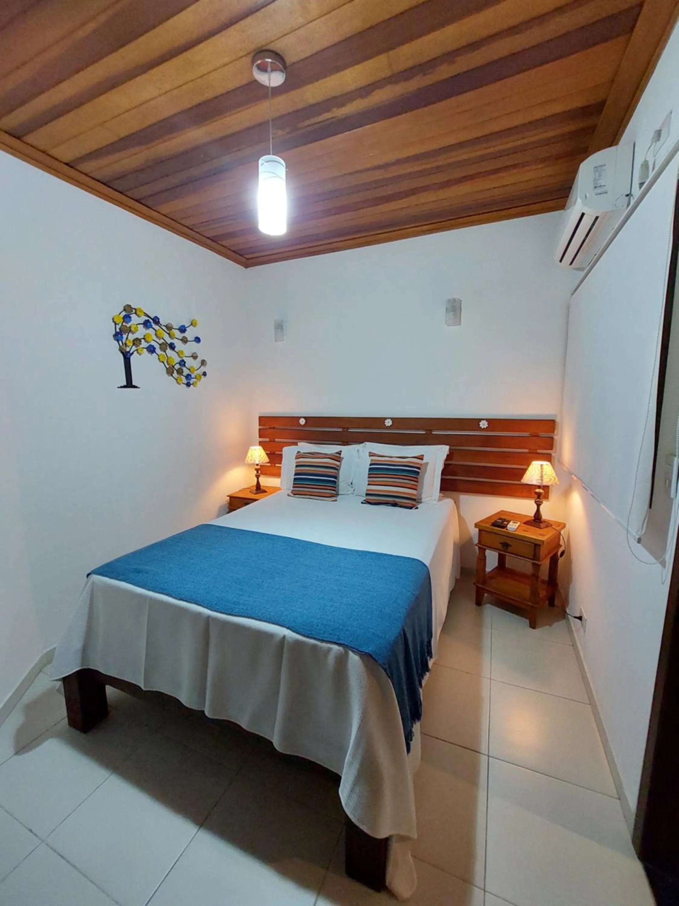 Bed in Pousada Canoa Caiçara Ilhabela