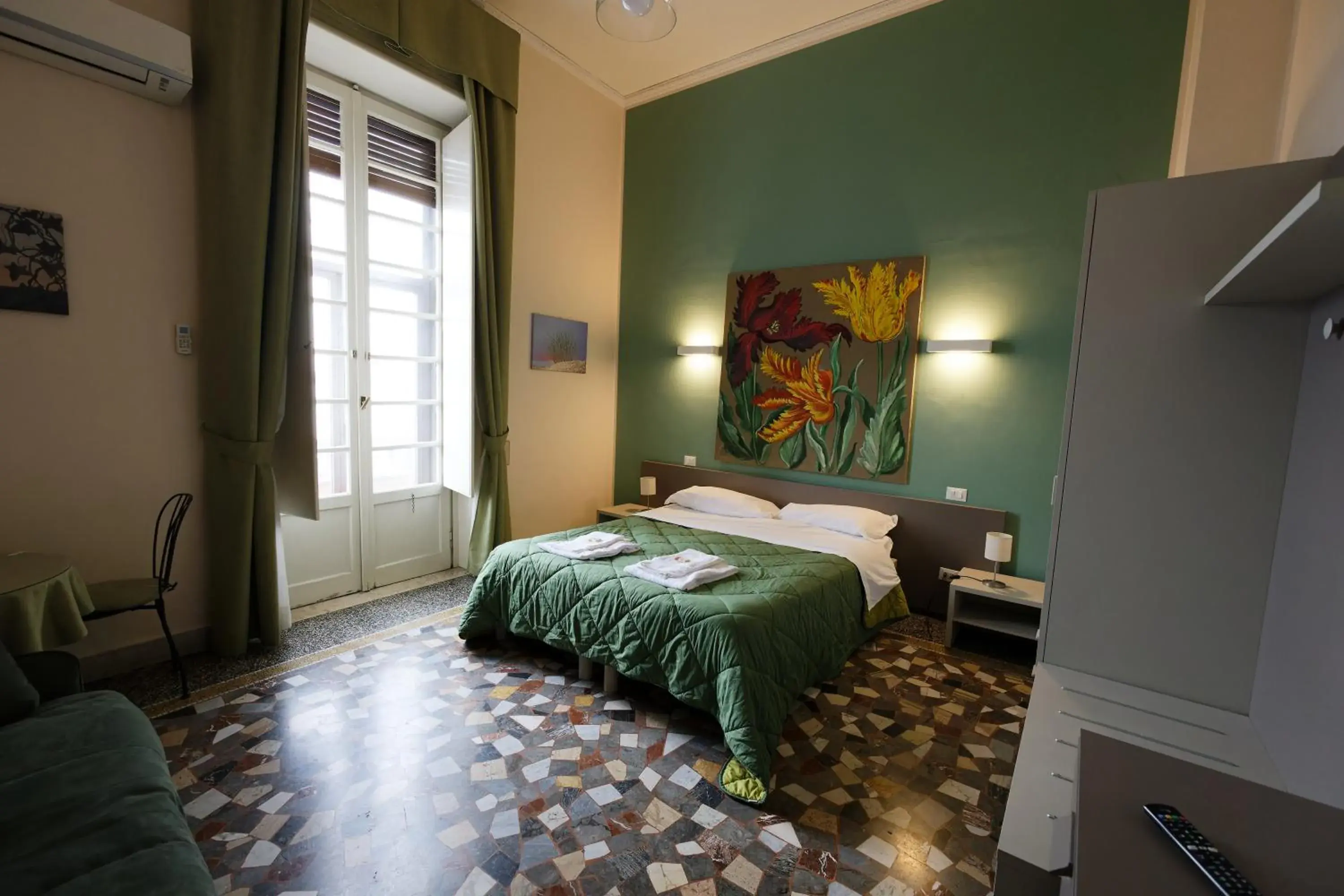 Standard Quadruple Room - single occupancy in Teatro sullo Stretto Standard Quadruple Room - single occupancy in Teatro sullo Stretto