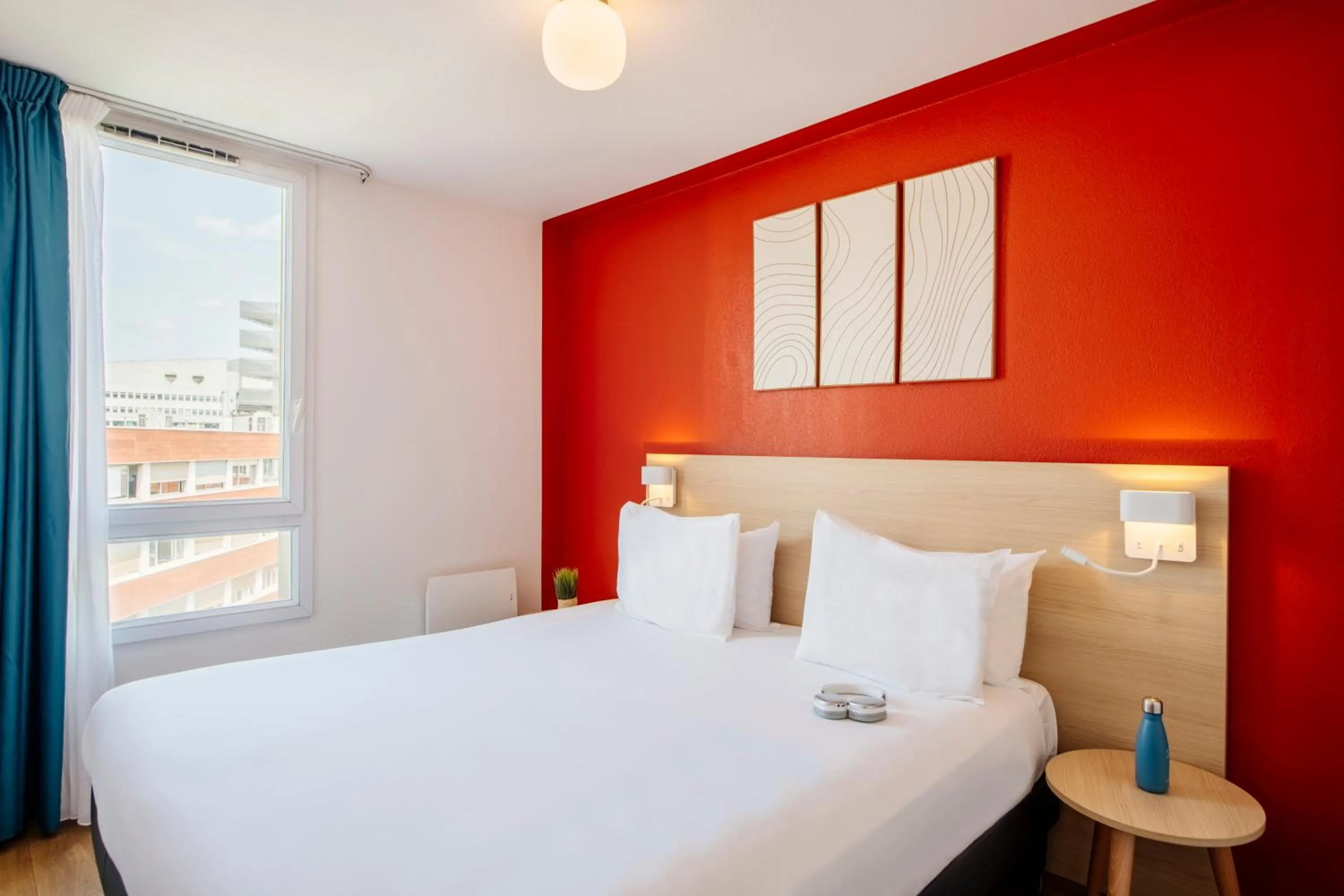 Bedroom, Bed in Aparthotel Adagio Access Paris Saint-Denis Pleyel