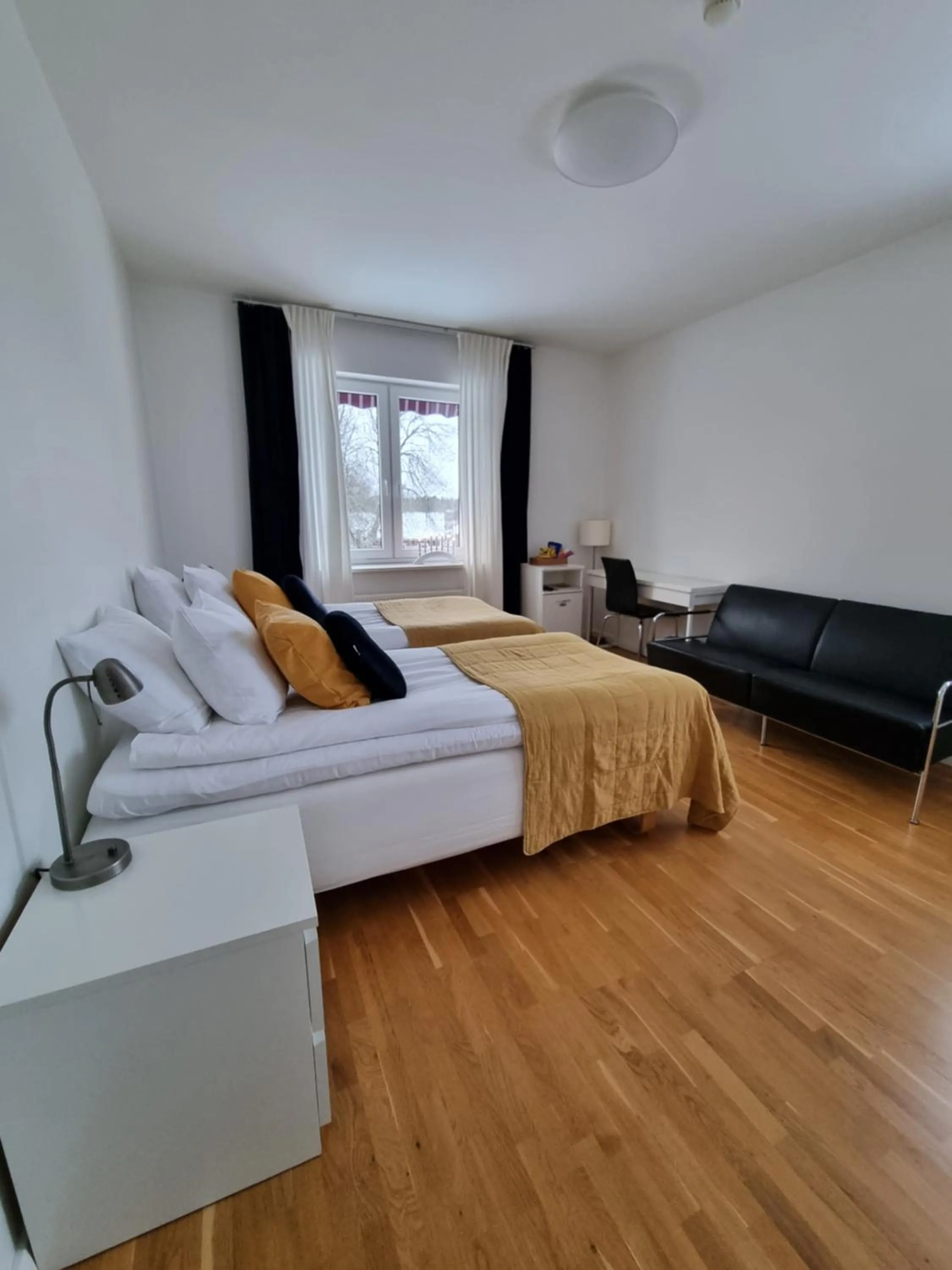 Bed in Gamla Järnhandeln - Norrskedika Hotell