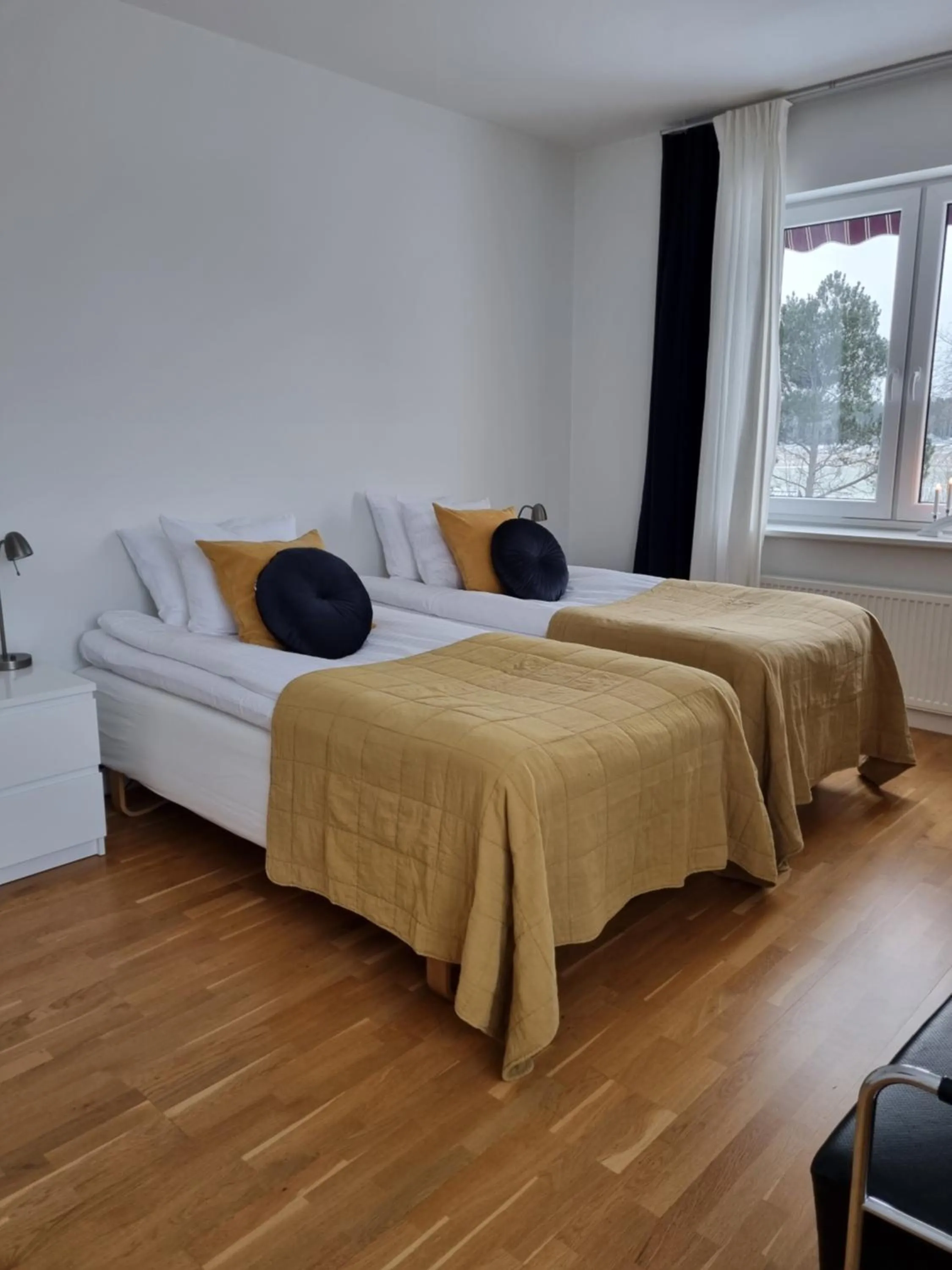 Bed in Gamla Järnhandeln - Norrskedika Hotell