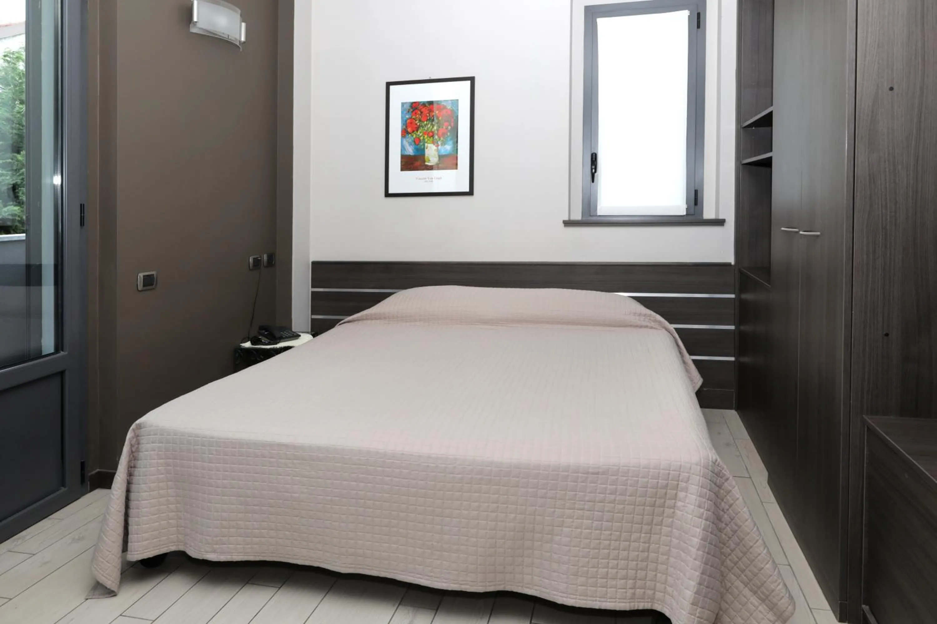 Bed in Hotel Residence Aurora