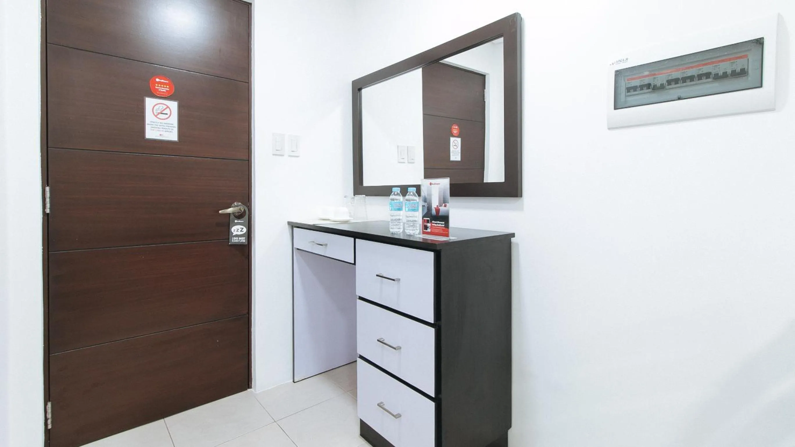 wardrobe in RedDoorz Plus at Evangelista Street Makati